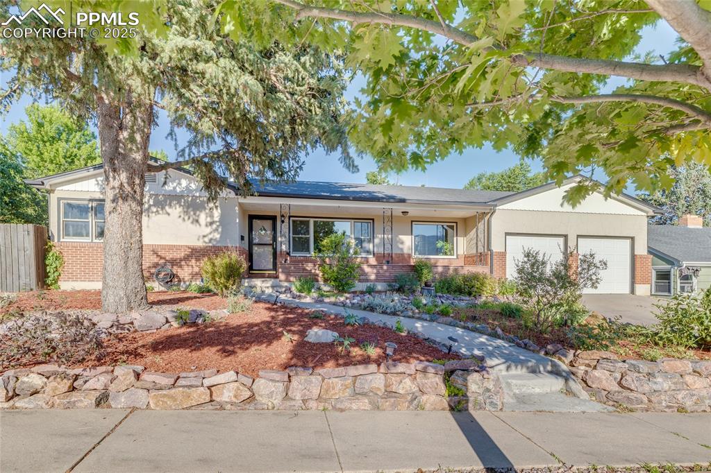 This home is a perfect gem in a very Highly Coveted neighborhood.  Built in a day when construction was done right.  In the center of town close by to Memorial Hospital, The Olympic Training Center, and of course the historic Patty Jewett Golf Course.  This home has been remodeled to reflect how we live today yet still has ties to its roots.  Of course, it has stainless steel appliances, vinyl windows and freshly finished original hardwood floors, New roof as well.  Just what you would expect.  It is home!  Come and see.  Also, at no extra charge a real "Fallout Shelter" which can be a perfect wine storage room or a secure area for pew pew's.