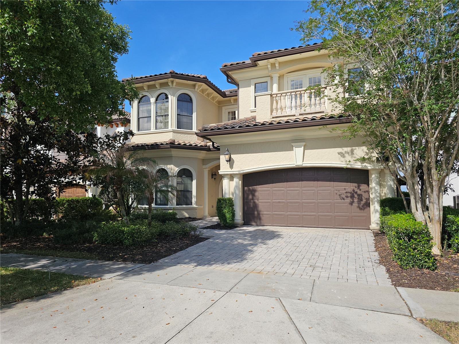 Custom Quality Built Home centrally located in the Reunion Florida Gated Community. 15 Minutes to Disney, 15 Minutes to Island H2O Water Park, 25 Minutes to Universal, 60 minutes to Atlantic Ocean, 45 Minutes to Hard Rock Casino, & just under a 2 Hour Drive to the Gulf of Mexico. There are over 20 Golf Courses & many Restaurants within a 10-mile radius. This home built in 2009 has a Grand Foyer Entrance with 11 feet high ceilings throughout. Grand Foyer Entrance walks into the home with a formal dining room, & opens up to an open floorplan combination of the Kitchen, Livingroom, & Gathering/Game Room with Sliding Glass Doors that open into the Pool Area & Lanai with a Summer Kitchen & Dining Area with Iron Outdoor Furniture. West Facing Back Yard for awesome sunsets! Pool & Hot Tub Combination. Off the Gathering/Game Room, the 1st Floor Master Suite BR1 is over 500 square feet which includes Bedroom, Walk Thru Closet, 3 Way Mirror Room (3 Way Mirrors on both sides of wall), Bathroom with Large Jacuzzi Tub that has an All Tile Shower that wraps around the Tub. Half Bath & Laundry Room with Cabinets & Deep Sink are on the 1st Floor. Beautiful Curved Staircase leading to 2nd Floor with wood floor steps, tile risers, wood rails, & iron spindles. Staircase area opens to the 2nd floor ceiling showing over 22 feet in height with large chandelier & faux ceiling. At top of Staircase the 2nd Floor Large Center Area leads into the additional 4 Bedrooms on 2nd Floor. 2nd Floor Master Suite BR2 is also a great size. 2nd Floor Bedroom 3 is 18x22 with a full bath. Both 2nd Floor Master Suite BR2 & BR3 have double doors leading into large covered balcony with an amazing panoramic golf view where you can watch golfers on the 10th Green on the golf course designed by the golf legend Jack Nicklaus. 2nd Floor Bedroom 4 & Bedroom 5 are in the Front area of home both have full baths with two 2nd Floor Balconies in front of home. 2 Car Garage (19x21) has its own air conditioner & Central Vacuum installed. Home being sold unfurnished. The Outdoor furniture, Pool Table, 1st Floor Bed Set & Dresser is included with home. Home has had many improvements completed just before listed. 2nd Floor New Luxury Vinyl Floors, New Balcony Tile, New Refrigerator & Dishwasher, & Interior Paint. For the buyer looking for either a residence, or a snowbird vacation home, or an investment for rental income as a short term rental, then this beautiful home is a must see!