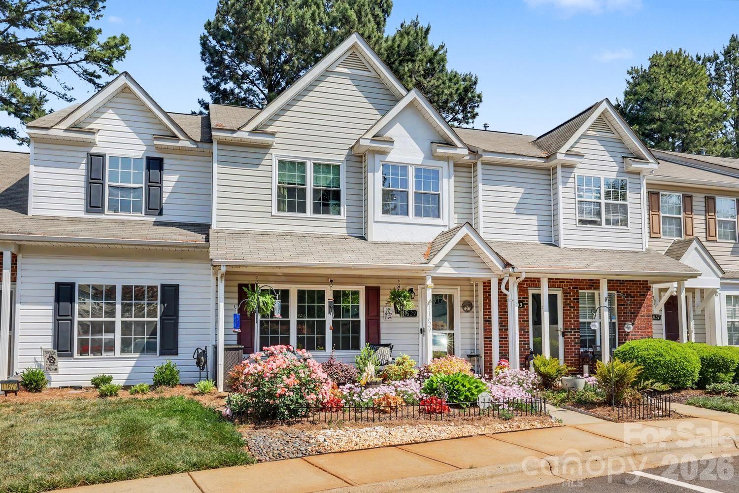 Tons of upgrades! You won't be disappointed. Welcome into the open living room with a cozy gas fireplace and tons of natural light. Warm luxury vinyl flooring throughout downstairs makes this home functional and designed for comfortable living. The bright, modern kitchen has an inviting feel with a mix of contemporary and rustic elements. Upgraded features include granite countertops, stainless appliances, gas range, textured stone backsplash, pendant lights and an island perfect for morning coffee or afternoon snacks. Upstairs you'll find the primary bedroom with vaulted ceilings and an upgraded ensuite bath with oversized shower and dual vanity. Two more spacious bedrooms and a full bath complete the upstairs. Private back patio is the perfect space for relaxing or grilling out! Community pool! The low-maintenance exterior and HOA-covered services allow you to spend more time enjoying your home and less time on upkeep. Located just minutes from interstates, restaurants and shopping! HVAC-2024, windows-2014 are just a few of the updates.