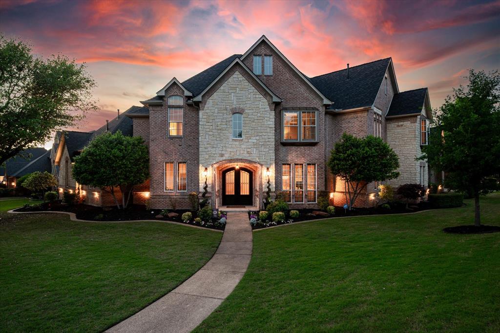 Stunning turn-key executive residence on a premier corner lot in Keller’s highly sought-after Wildwood Estates, just minutes from Westlake, Southlake, and downtown Keller. Beautifully updated, this exceptional home blends timeless elegance, modern comfort, and superior craftsmanship throughout. The functional floor plan offers five spacious bedrooms, each with a private en-suite bath and walk-in closet, ideal for both privacy and entertaining.The four-car garage features epoxy floors and EV-charger wiring. Notable upgrades include solid hardwood flooring, extensive crown molding, plantation shutters, fire-proof cabinetry, whole-house central vacuum, and striking double iron-and-glass entry doors. The main level showcases soaring ceilings, a graceful curved staircase, coffered ceilings in the study, and designer mid-century modern lighting. Formal living areas feature dual fireplaces, expansive windows, and serene backyard views. The gourmet kitchen offers a walk-in pantry and seamless flow to the main living spaces. Upstairs includes a cinema-experience home theater (equipment conveys), oversized game room, and dramatic ceiling heights. The private backyard oasis features an executive-size pool with fountains, flagstone patio, built-in grill, and lush landscaping with automated lighting. A rare 360-square foot climate-controlled cabana provides flexible space for a gym, office, or studio. The main-level primary suite overlooks the backyard and includes a spa-inspired bath and custom boutique-style closet. An exceptional opportunity in one of Keller’s most desirable neighborhoods. Roof was replaced approximately 5 years ago. Care has been taken to provide accurate information but buyers and buyers agents please verify all measurements, taxes and schools.