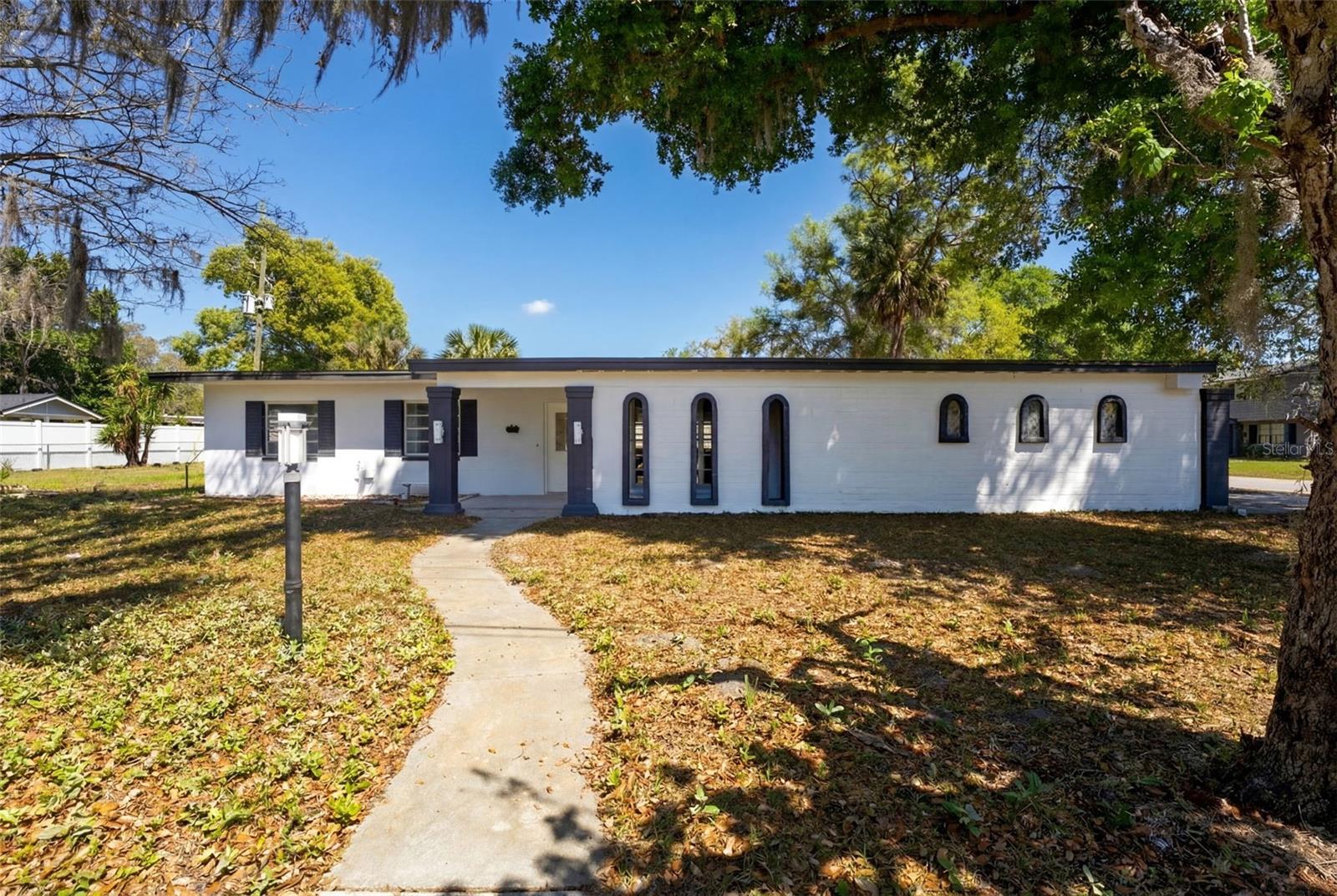 Beautifully renovated and move-in ready, this 3-bedroom, 2-bath home offers modern design in a .24 acre lots, solid upgrades, and comfortable living in a prime Maitland location. Featuring an open-concept layout filled with abundant natural light, the home delivers a warm and inviting atmosphere from the moment you enter. The updated kitchen serves as the heart of the home, showcasing sleek cabinetry, a spacious island, and a full suite of stainless steel appliances, including refrigerator, stove, microwave, dishwasher, washer, dryer, and range hood—ideal for both everyday living and entertaining. Contemporary flooring flows seamlessly throughout, enhancing the home’s clean and modern aesthetic. Major systems have been thoughtfully updated, providing peace of mind to the next owner: roof replaced in 2021, A/C updated in 2019, and water heater installed in 2020. The home features copper electrical wiring and durable plumbing with cross-linked polyethylene inside walls and PVC piping beneath, reflecting quality construction and modernization. Spacious living areas delivers comfort and functionality, while the backyard provides a versatile outdoor space ready for relaxation, entertaining, or personalization. The property includes a 2-car garage and is located in a community with NO HOA and NO CDD, offering flexibility and lower ownership costs.  Conveniently situated near major roads, shopping, dining, and everyday amenities, this home presents an excellent opportunity for buyers seeking style, reliability, and location in one complete package.