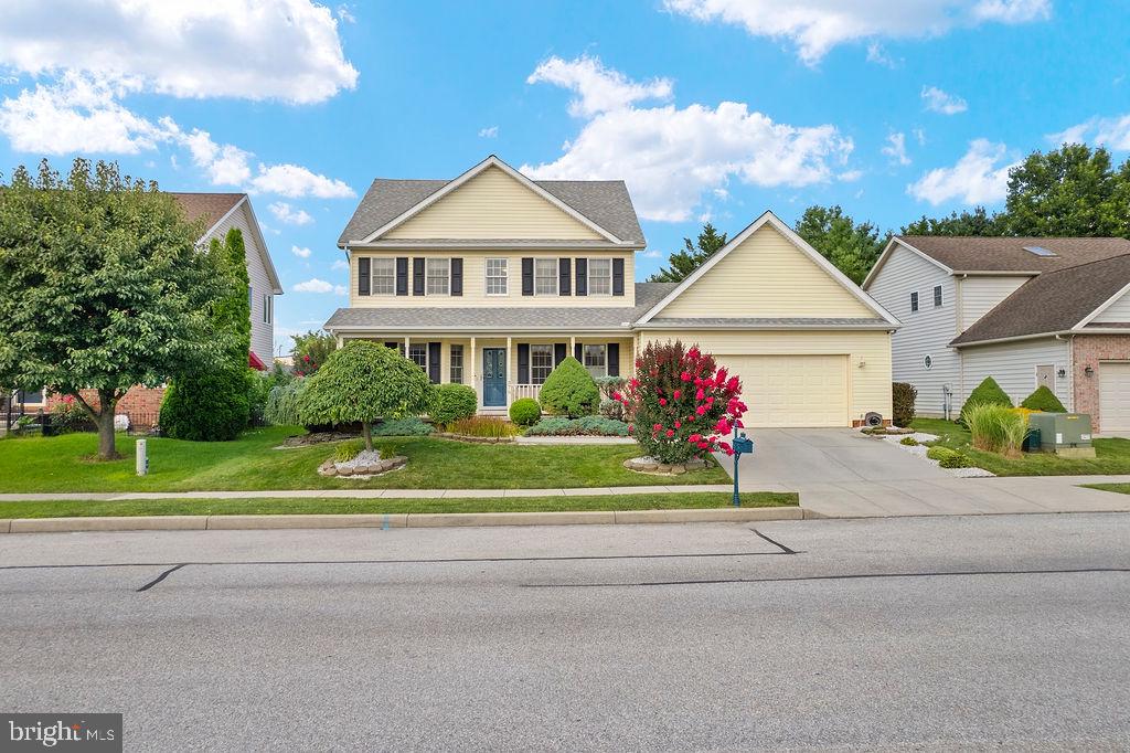 Welcome to this beautifully maintained traditional two-story home featuring 3 spacious bedrooms, 2 full bathrooms, and a convenient half bath. From the moment you arrive, you'll be impressed by the inviting curb appeal, complete with manicured landscaping and a spacious front porch perfect for morning coffee or evening relaxation.Step inside to an open and airy layout, highlighted by a vaulted ceiling in the foyer and custom window coverings throughout. The main level offers a bright and functional kitchen with a breakfast nook, custom backsplash, pantry, and newer appliances—ideal for everyday living and entertaining.The extra-large primary suite is a true retreat, featuring a walk-in closet, double vanity, and luxurious soaking tub for ultimate relaxation. Two additional bedrooms provide ample space for family or guests.Enjoy the added value of a finished basement with extra storage and room to expand—perfect for a home office, rec room, or fitness area. The home also includes a fenced back yard and two-car garage with additional nearby parking for guests.This well-appointed property combines timeless design with thoughtful upgrades. Don’t miss your chance to own this beautiful home that offers comfort, space, and style in every detail. Schedule your showing today!This is not an HOA and the property to the rear of the property is borough ownership to never be developed.  In addition the patio furniture is included.