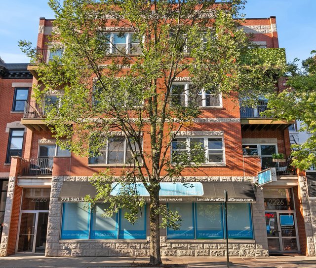 Perfectly located in the heart of Lincoln Park, moments from Oz Park, this spacious 2BD/2BA condo in a boutique elevator building offers 1,400 sq ft of airy, modern living. Enjoy soaring 10-11 ft ceilings, seamless hardwood floors, a private balcony, brand-new 2025 windows, and heated attached garage parking with additional bike storage. The open living/dining room is ideal for entertaining, while the split-bedroom floor plan ensures privacy. The primary suite is a true retreat with multiple walk-in closets, Elfa organization, and a spa-inspired bath featuring a double vanity, separate shower, and oversized soaking jacuzzi tub. The second bedroom easily fits a queen bed or makes a perfect office. The kitchen boasts 42" maple cabinets, granite counters, and stainless steel appliances. Thoughtful updates include 2025 remodeled bathrooms, 2024 Benjamin Moore paint, newer light fixtures, Pottery Barn/West Elm window treatments, and custom Room & Board storage, plus 2020 furnace and A/C. Building highlights include professional management, healthy reserves, low assessments, and very pet-friendly policies (no size or breed restrictions & no pet fees). Close proximity to the Fullerton Red/Brown/Purple lines, bus routes, and all the shops, restaurants, and nightlife along Armitage, Halsted, Fullerton, and Lincoln. Lincoln Park's farmers market, Lincoln Park Zoo, nature trails, bike paths, and the lakefront are just minutes away. Truly a move-in ready gem in an unbeatable location!