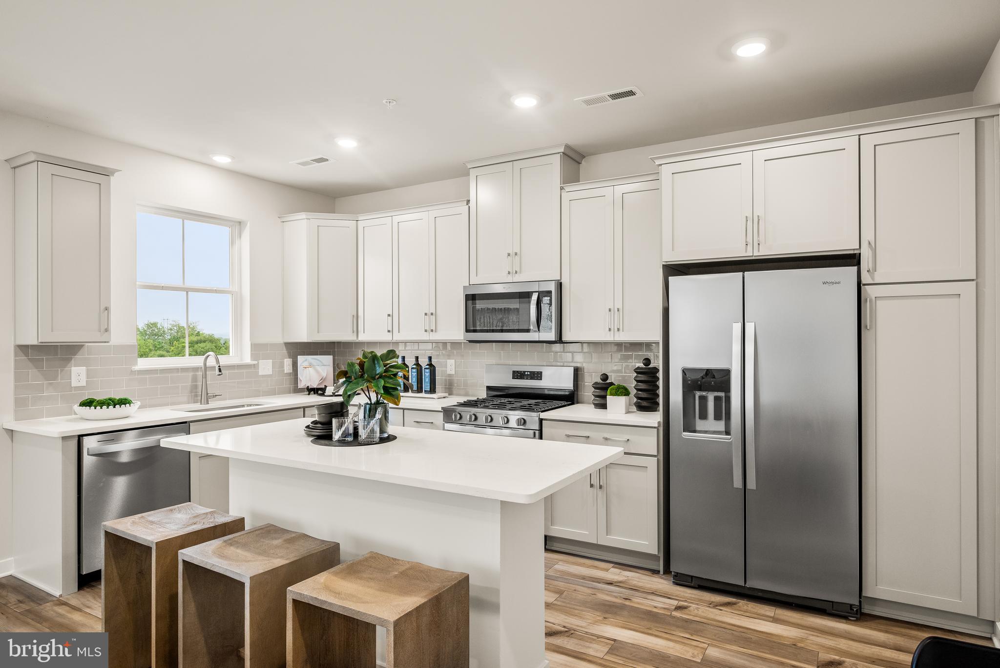 Get a jump on the busy spring market and lock in your dream home now. Welcome to 854 Graphite Drive, a 3 BR/2.5 BA townhome in the sought-after Phoenixville Heights community. Located just minutes from vibrant downtown Phoenixville and offering direct access to the scenic Schuylkill River Trail, this home puts walking, biking, dining, and weekend adventures right at your doorstep.This move-in-ready home features the popular Piper floorplan, thoughtfully designed for low-maintenance living with smart layouts and on-trend finishes throughout.The entry level welcomes you with a bright foyer and convenient inside access from the garage—perfect for everyday ease.On the main level, an airy open-concept design connects the spacious Great Room to a sleek, modern kitchen showcasing carrara white quartz countertops, upgraded silver cabinetry, 3X6 white gloss designer backsplash, and a stainless steel counter-depth side-by-side refrigerator—some of the most in-demand upgrades already included. The dining area opens to a composite deck with white vinyl rails, ideal for morning coffee, entertaining, or unwinding at the end of the day.Upstairs, all three bedrooms offer comfort and privacy. The owner’s suite includes a private bath, while the secondary bedrooms provide flexible space for guests, a home office, or hobbies. Additional highlights include stained oak stairs with painted risers and a first-floor powder room for added convenience.A roomy garage with inside access completes the home, blending style, function, and a lifestyle-focused location.Have a furry family member? Phoenixville Heights has a community dog park, making it easy to enjoy a low-maintenance home while giving your pup room to play. Beautifully finished, move-in ready, and close to everything Phoenixville has to offer—opportunities like this don’t last long. Make 850 Graphite Drive yours before the spring rush is in full swing.Note: Model homes now ready to tour! Prices, dimensions, and features may vary and are subject to change. Photos are for illustrative purposes only - please see new home consultant for final options and finishes. If you’re working with a Realtor, please ensure they are acknowledged as your representative during your first interaction with Lennar and accompany you on your first visit. Taxes are assessed after settlement. Please visit the sales trailer for open house access.