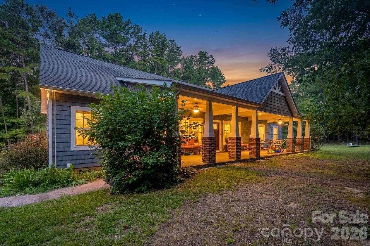 Welcome to 13891 Connor Road, where country living, privacy and versatility come together on nearly 6 acres. Offering approximately 2,543 sq. ft., this inviting home features 3 bedrooms, 2 full baths, a main-level primary suite and expansive additional living space that provides flexibility for a home office, bonus room, recreation area, studio or guest space.The updated kitchen features granite countertops, a farmhouse sink, stainless steel appliances, soft-close cabinetry and generous workspace. The spacious rocking-chair front porch offers the perfect place to relax and enjoy the peaceful surroundings.Outside, the property truly shines with a large detached two-car garage/workshop, two driveways, abundant parking for vehicles, RVs or recreational equipment, partially fenced acreage and multiple structures offering storage or space for small farm animals. Mature trees and the generous lot provide privacy and room to enjoy the outdoors.With no HOA, Mount Pleasant schools and nearly 6 acres, this property offers a rare combination of space, flexibility and country living while remaining convenient to surrounding communities.