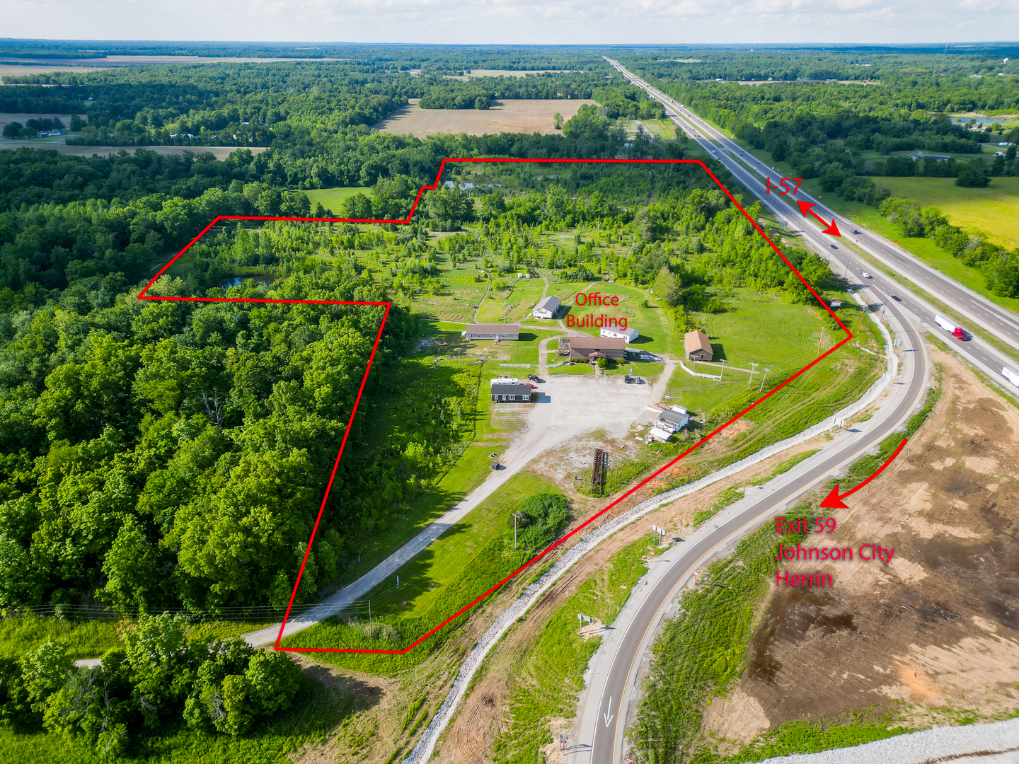 23.82 acres for sale or lease located at the Northwest corner of the I-57 exit 59 Johnston City. Just five minutes north of Marion, IL exits. Over 40,000 cars a day on the recent six lane expansion of I-57. TIF incentives available, all city utilities available. Zoned B-2 Primary Business District now, but it could be changed. Located at the Official exit off I-57 for the Newly opened Walker's Bluff Casino & convention center located approximately 20 minutes west of this exchange. Excellent location for a truck stop, hotel, restaurant, or strip mall. 660 feet of I-57 frontage available. A modern two-story brick building on the property is now being used as a showroom and office space. An additional 17.65 acres is available for sale or lease. Will divide and sell or lease the ground. Current address is 11478 Imhoff Lane, Johnston City, IL 62951.  SELLER FINANCING AVAILABLE