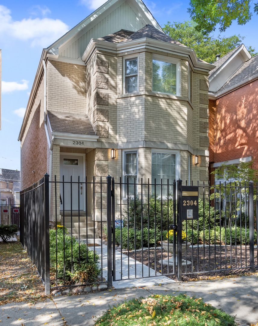 Welcome to 2304 N Greenview - an absolutely perfect 3 bedroom, 3.5 bath single-family home on one of the most beautiful, tree-lined streets in all of Lincoln Park. This timeless all-brick residence blends classic charm with thoughtful modern updates, offering a rare opportunity to own on one of the neighborhood's most desirable blocks. Step inside to a welcoming foyer and bright living room, highlighted by new oversized skylights that flood the home with natural light. A wood-burning fireplace with gas starter anchors the living and dining rooms, while the updated eat-in kitchen and spacious family room create the perfect setting for everyday living and entertaining. French doors lead out to a custom deck and lush backyard-ideal for indoor-outdoor living. Upstairs, the primary suite impresses with soaring 11'8" ceilings (vaulted to 16' under the skylight), a huge walk-in closet, and a spa-like bath with a soaking tub and separate shower. Two additional large bedrooms and a full bath complete the second level, with skylights enhancing natural light throughout. The partially finished lower level offers a large recreation room, laundry, mudroom, abundant storage, and the potential to add a fourth bedroom. A standout feature of this home is its outdoor space-a fully fenced backyard shaded by mature trees, perfect for play, gardening, or quiet relaxation. A 2.5-car garage provides plenty of room for parking and storage. Recent updates include kitchen and bath renovations, new lighting, flooring, carpet, HVAC, hot water heater, and more-making this home move-in ready while still offering value-add potential. Zoned RT-4 with a maximum building height of 38 feet, there is room to expand or customize. All this, ideally located in the highly rated Oscar Mayer Elementary and Lincoln Park High School districts. Just moments from neighborhood favorites like Pequod's Pizza, Clover Park, and Wrightwood Park's pool, plus easy access to grocery stores, public transit, and Lakeshore Sport & Fitness. Only about 2 miles to the lakefront. This is a rare opportunity to own a true Lincoln Park classic on one of its most coveted streets.