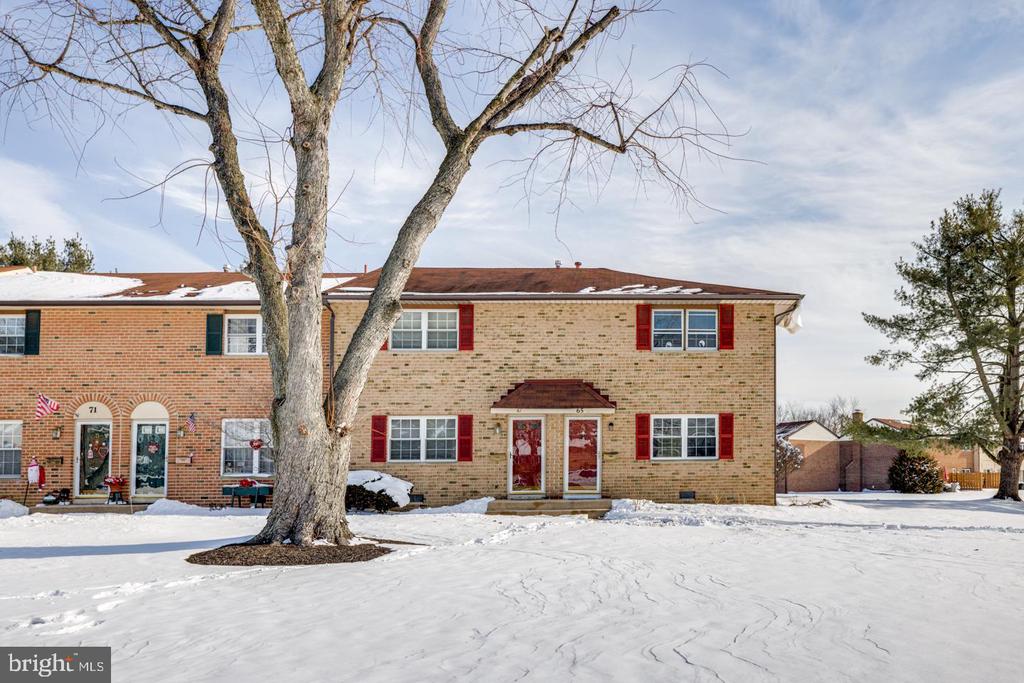 This beautifully renovated two-story, two-bedroom, 1.5-bath end-unit townhome in sought-after Medford Mill is truly move-in ready and waiting for its new owner to enjoy! Fully renovated only a few years ago, this home features luxury vinyl plank flooring throughout the first floor and continuing upstairs into the hallway, complemented by soothing gray walls that create a modern, neutral palette. The kitchen has been completely updated with crisp white cabinetry and a full stainless steel appliance package, including a gas range, microwave, refrigerator, and dishwasher. Just off the kitchen, a door opens to a convenient utility/laundry room with a stacked washer and dryer and the newer heater. Upstairs, the primary bedroom offers plush neutral carpeting and two generously sized closets. The second bedroom is also spacious and features soft neutral carpeting and ample closet space. The refreshed full hall bath includes a tub with tile surround. Enjoy the unbeatable location—just a short walk to Downtown Medford, where you can explore charming shops, boutiques, breweries, and restaurants. Residents of Medford Mill also enjoy easy access to seasonal community events such as the Fourth of July fireworks, Dickens Festival, and Summer Art Festival. Be sure to visit the community pool—another fantastic amenity!  Don’t miss this rare opportunity to own a 2-bedroom, 1.5-bath end-unit in this desirable community. Hurry—this one won’t last!