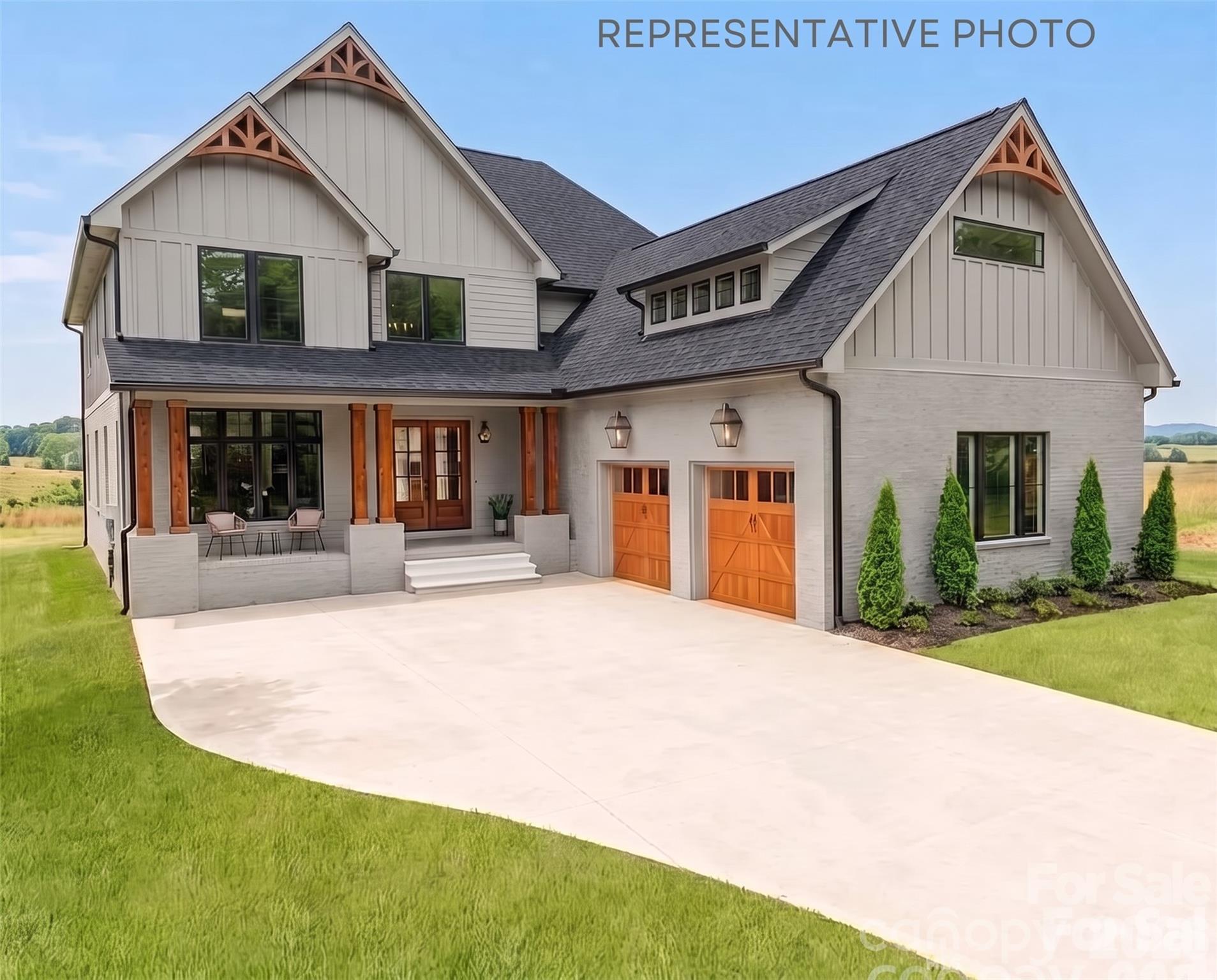 Discover exceptional luxury in this stunning 6-bedroom, 6 full bath, and 2 half bath modern farmhouse, offering 5,295 square feet of thoughtfully designed living space. Showcasing a striking black exterior, this home blends bold contemporary style with timeless farmhouse charm.Inside, you’ll find expansive open-concept living areas, soaring ceilings, and high-end finishes throughout. The gourmet kitchen is a showstopper, featuring premium appliances, custom cabinetry, and an oversized island perfect for entertaining.  Built with attention to detail and quality craftsmanship, this home also offers customization options, allowing you to tailor finishes and features to your personal taste. Call today to get more information