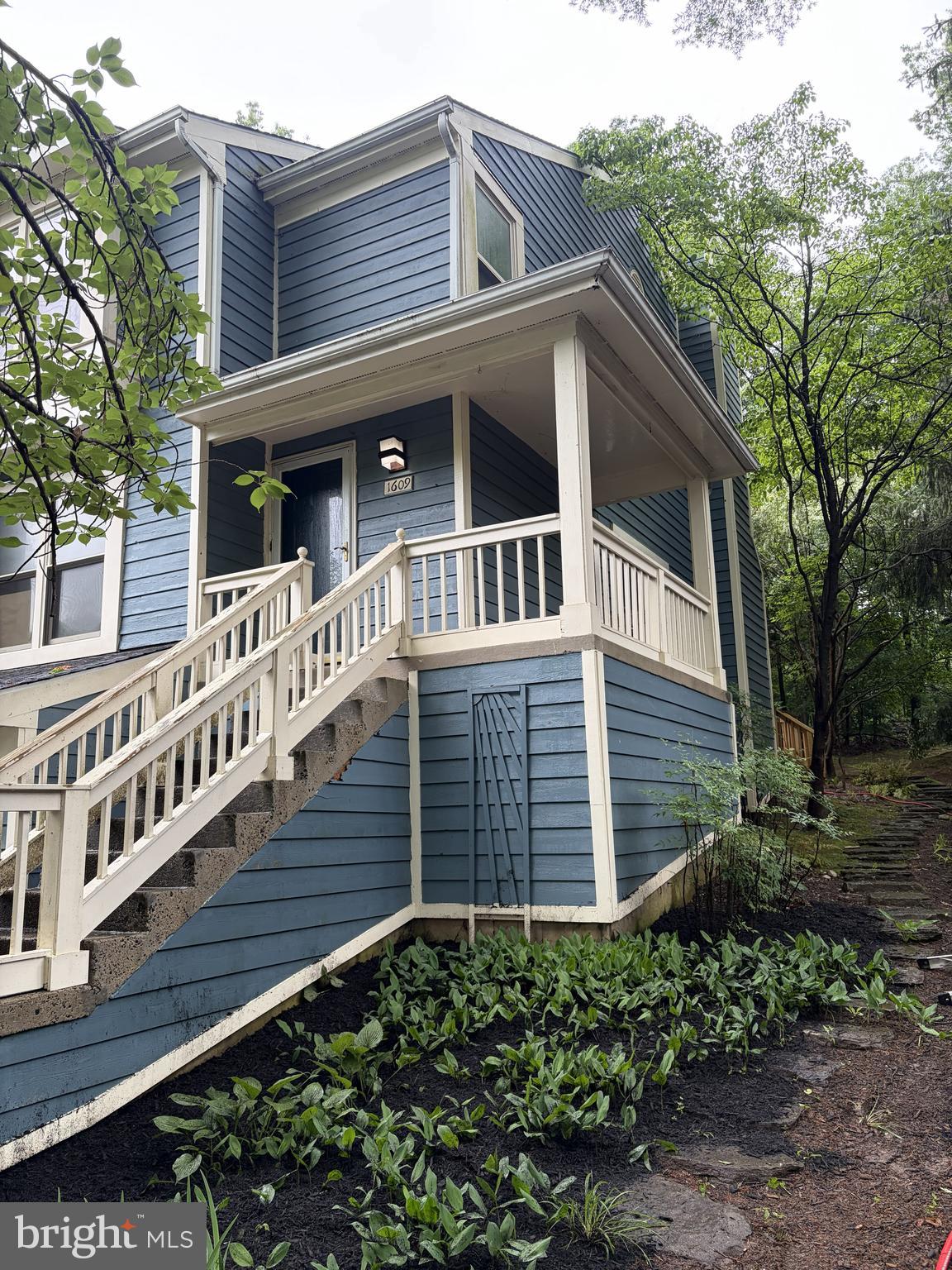 Welcome to Oak Spring! Located in one of Reston’s most sought-after communities, this spacious 3-bedroom, 2 full and 2 half-bath end-unit townhouse offers a peaceful wooded setting with thoughtful updates throughout. Fresh landscaping, a wraparound front porch, and a custom stone walkway create welcoming curb appeal. Inside, the main level features hardwood floors, abundant natural light, and a functional layout ideal for both everyday living and entertaining. The spacious living area flows into the kitchen, which includes stainless steel appliances, ample cabinet space, and plenty of natural light. Just off the kitchen, step onto the private deck overlooking the woods — the perfect spot to enjoy your morning coffee or unwind in the evening. Several rooms have been recently painted, giving the home a fresh and updated feel. A convenient half bath completes the main level. Upstairs, the primary suite features an updated en-suite bath, along with two additional bedrooms and a second full bathroom. The finished lower level offers a versatile recreation room, additional half bath, storage space, and direct access to the attached one-car garage and private driveway. Enjoy all that Reston has to offer, including nearby trails, lakes, shopping, dining, parks, and convenient Metro access. A MUST SEE!