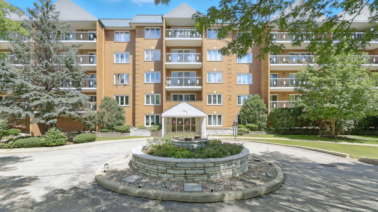 Truly Beautiful Corner Unit Condo - Move-In Ready!    This stunning 2-bedroom, 2-bathroom condo offers one of the largest floor plans in the building and is filled with natural light. The spacious primary suite features a private en-suite bathroom with a jacuzzi tub-sold as-is but it makes a wonderful soaking tub for relaxation. A versatile bonus room with a cozy fireplace is currently used as a family room but could also make a wonderful home office or den.    The remodeled kitchen (2018) includes an eat-in area and abundant cabinet space, while both bathrooms were also updated in 2018. All appliances were replaced during the remodel. Flooring in the living room, dining room, and bedrooms was updated in 2011, and windows were replaced in 2021 (excluding the bay window).    This well-cared-for home boasts many recent updates: new roof (2023), new boiler (2019), and new HVAC (2017). Additional highlights include in-unit laundry, two storage rooms, an attached garage space, and a large balcony-perfect for relaxing outdoors.    Located in a well-maintained, self-managed building, this condo is in immaculate, move-in condition. It is truly a beautiful home inside and out-come see it for yourself!