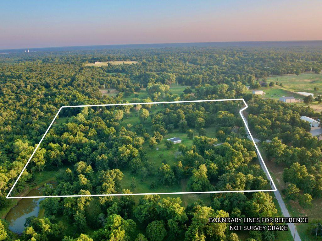 Create a lasting legacy with this beautiful 13.24 +/- acre homesite in the gated community of Turkey Trails. Ideal for a custom home, this property offers the perfect setting for a private family retreat or generational estate. Light covenants and restrictions help protect your investment while preserving the area's rural character.The gently rolling terrain features a scenic valley of mature hardwoods, a small pond with expansion potential, and abundant wildlife, including mature whitetail bucks, turkey, hogs, and deer. A 600 +/- sq. ft. shop with electricity, a private water well, high-speed OEC Fiber/AT&T internet, and a covered lean-to provides a valuable head start for future improvements.Located less than 3 miles from Lake Thunderbird and just minutes from Norman, you'll enjoy easy access to boating, fishing, shopping, dining, and top-rated Norman Public Schools. Whether you're building your forever home or creating a property to enjoy for generations, this exceptional acreage offers privacy, recreation, and lasting value.
