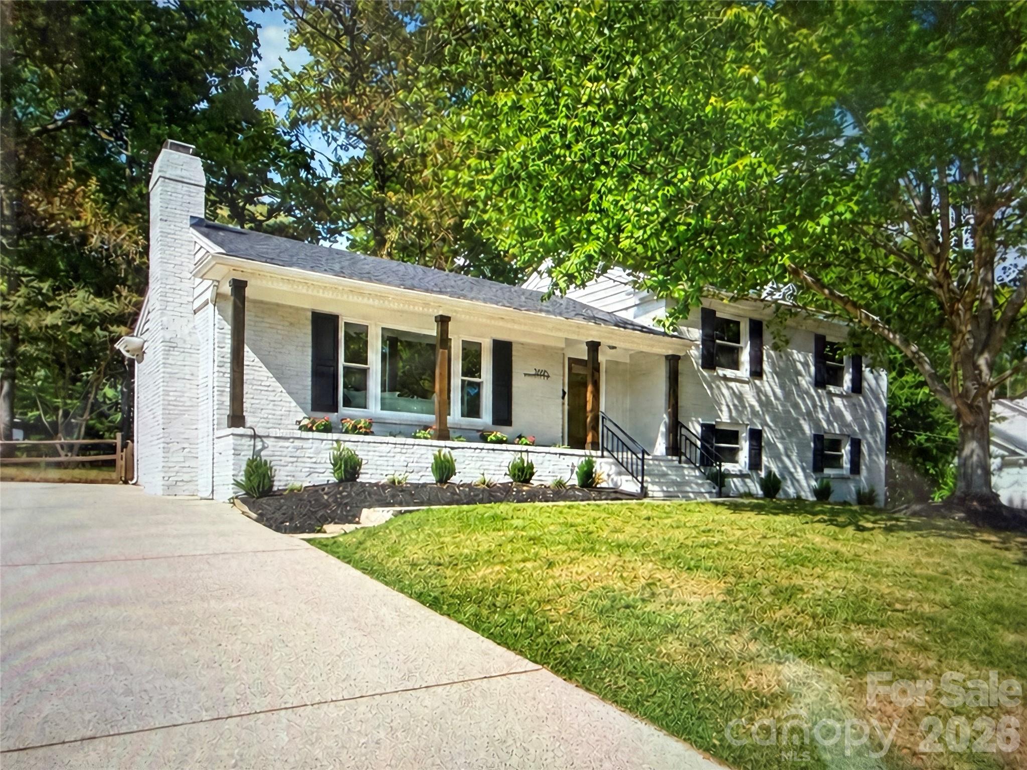 Welcome to 3918 Rhodes Avenue, a beautifully updated split-level home nestled in the highly sought-after Beverly Woods neighborhood in the heart of Charlotte! Thoughtfully refreshed inside and out, this home perfectly blends classic charm with modern updates. Step inside to find refinished hardwood floors, fresh interior paint, new lighting and ceiling fans, and luxury vinyl plank flooring throughout the lower level. The updated kitchen is ready for everyday living and entertaining, while refreshed bathrooms feature updated vanities, mirrors, fixtures, and finishes. Upstairs, custom closets provide enhanced storage, and additional attic insulation adds energy efficiency.The exterior has been equally transformed with fresh paint, new wood columns, front step handrails, four new exterior doors, energy-efficient windows and sliding glass door, plus refreshed landscaping with a convenient drip irrigation system. Additional improvements include a new hot water heater and upgraded electrical panel.With its flexible split-level layout, extensive updates, and prime Beverly Woods location, this move-in-ready home offers the perfect opportunity to enjoy one of Charlotte’s most established neighborhoods. Conveniently located near SouthPark with easy access to shopping, dining, entertainment, and all that Charlotte has to offer!