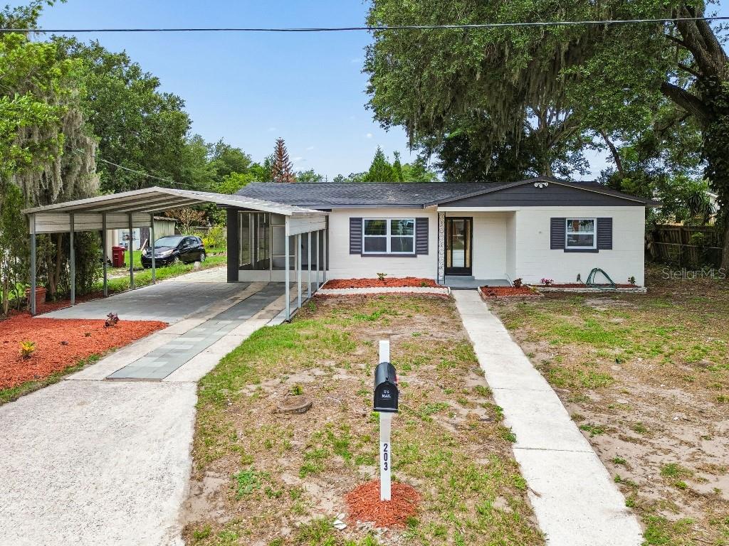 Welcome to this move-in-ready fully renovated 4-bedroom, 2-bath home ideally situated in the heart of Plant City. This inviting single-story residence features comfortable living spaces, vinyl flooring, central air and heat, a covered front porch, screened lanai, and covered carport parking. Conveniently located just minutes from downtown Plant City, residents will enjoy quick access to shopping, dining, schools, and major commuter routes. Outdoor enthusiasts will appreciate a 5 minute walk from Burchwood Park, offering recreational amenities, walking areas, playgrounds, and green space for year-round enjoyment. Whether you're looking for your primary residence or your next investment opportunity, this home offers the perfect blend of comfort, convenience, and location.