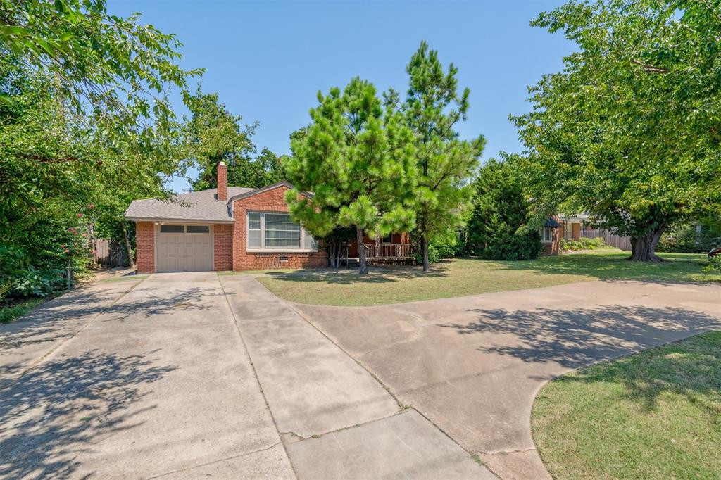 Great rental in one of the most iconic neighborhoods in the Oklahoma City Metro, Nichols Hills. Conveniently located near Classen Curve, Nichols Hills Plaza, Whole Foods, Trader Joe's, Oak and more. This 2 Bed, 1.5 bath home features a living room with fireplace, a dining space that flows to the kitchen, an office with ensuite, wood floors, storage spaces, and bright natural light throughout. The kitchen includes stainless steel appliances, good cabinet space, plus a built-in breakfast nook. The large, covered porch and tree lined backyard patio are great for entertaining. Washer/dryer hookup inside, and one car garage with circle drive.