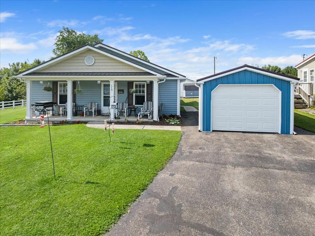 Charming One-Level Living on a Beautiful .34 Acre Lot! Welcome to 518 Walnut Avenue in Rural Retreat, where comfort, functionality, and country charm come together. This well-maintained 3 bedroom, 2 bath home offers 1,504 square feet of comfortable living space on a level .34 acre lot with room to relax, play, and enjoy the outdoors.  Step inside to find beautiful hardwood and tile flooring throughout, creating a warm and inviting atmosphere. The enclosed back porch provides valuable additional living space and is perfect for a home office, playroom, guest room, hobby area, or bonus room to fit your family's needs.  Enjoy peaceful mornings and relaxing evenings on the covered front porch overlooking the spacious yard. Recent updates include a newer heat pump installed in 2021, a PEX plumbing system, energy-efficient insulated tilt windows for easy cleaning, and a durable metal roof, offering long-lasting value and peace of mind.  The detached 12' x 21' garage provides excellent space for parking, storage, or a workshop, while the level .34 acre lot offers endless possibilities for gardening, outdoor entertaining, or simply enjoying the open space.  Conveniently located just minutes from downtown Rural Retreat, local schools, shopping, and Interstate 81, this move-in-ready home offers the perfect combination of small-town living and everyday convenience. Whether you're purchasing your first home, downsizing, or simply looking for one level living with extra space, this property is ready to welcome you home. Schedule your private showing today!