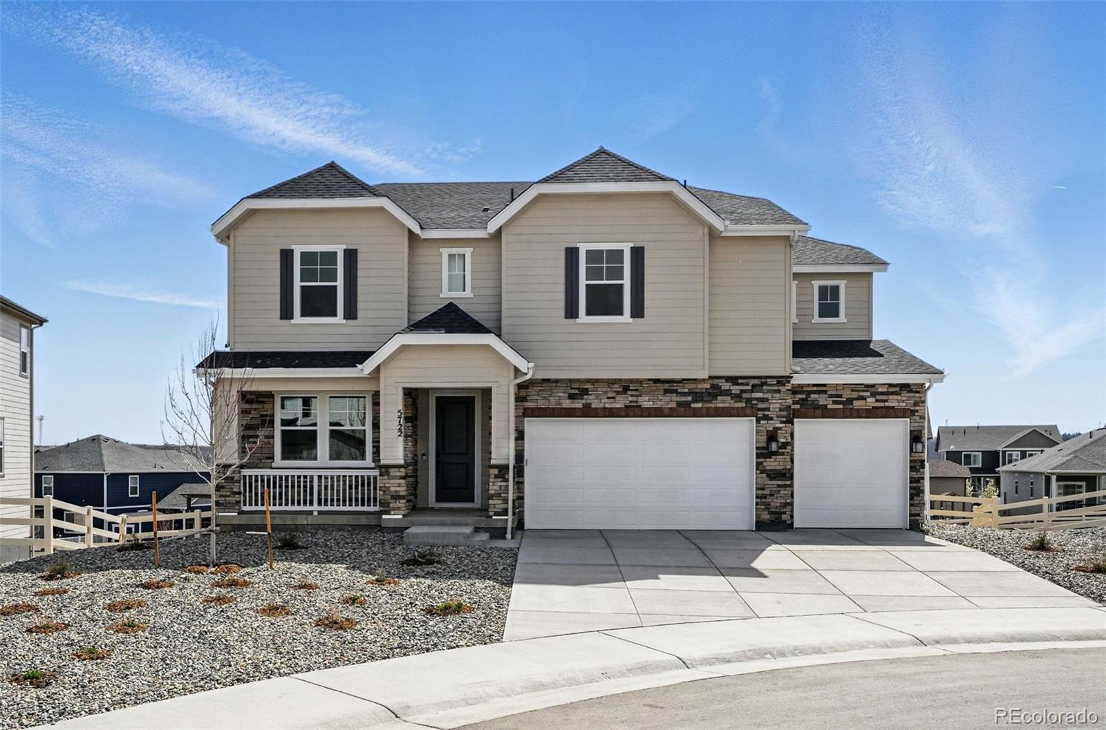 MLS#2278400 New Construction - Ready Now! Upon entering the Vail at Crystal Valley, you'll pass the study through the foyer and be welcomed into the striking two-story great room, which seamlessly connects to the casual dining area and kitchen, as well as a hearth room featuring a double-sided fireplace. Upstairs, you'll find three secondary bedrooms, three full baths, and a convenient laundry room. You'll also discover an oversized storage closet and a luxurious primary suite with dual closets, sinks, and a spacious walk-in closet. Structural options added include; Fireplace, Sliding glass door, hearth room with two-sided fireplace, 8x 12 center meet sliding glass door in great room, shower and free-standing tub in primary bath, covered deck, walkout basement.
