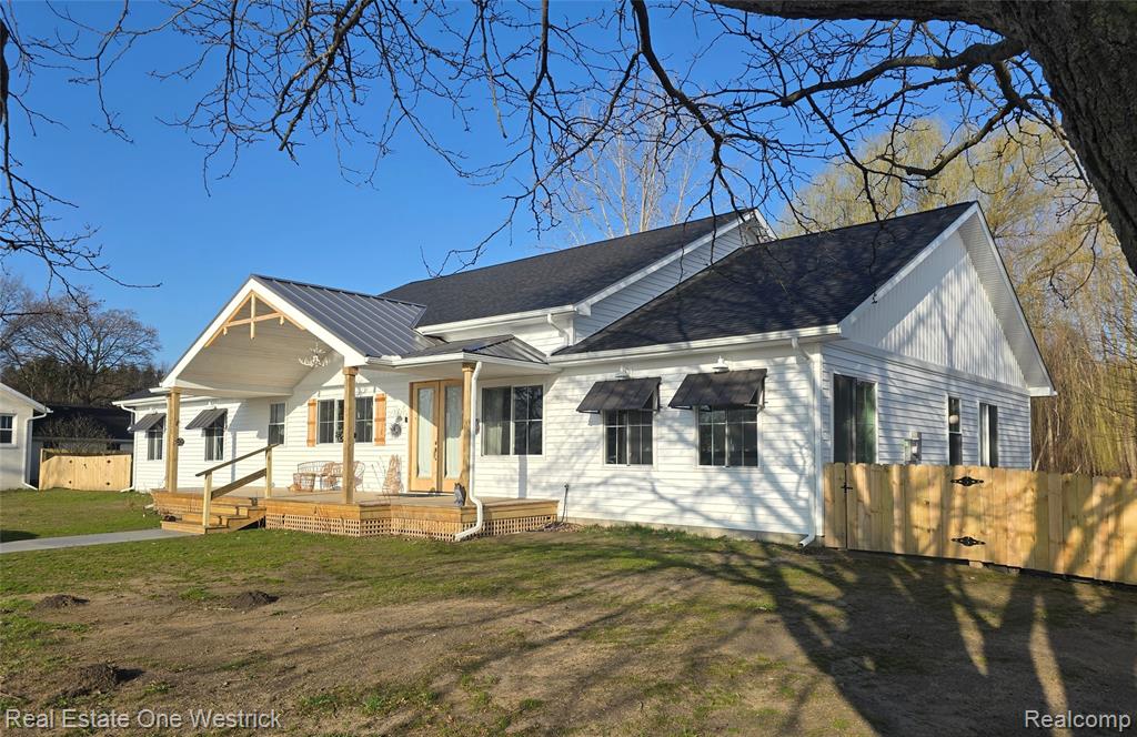 Motivated Sellers.Dream yard in Clay Townhip on 4.9 acres backing up to 1500 beautiful acres of state land. Take a 700ft stroll in your back yard and you will find the paved bridge to bay walking trail. This trail can take you into the (going north) Algonac State Park or (going south)directly in to the heart of Algonac. Less then 100 steps away out the front door and you will arrive at the Algonac Beach. Perfect for swimming, fishing, sight seeing or put your watercraft into the water and ride the waves. Views from the east and north end of the home are spectacular for boat watching. When taking the trail in to the Algonac State Park, buyers can enjoy many of the amenities. This conventionally built (year 2025) 3010sqft barndominuim has room for everyone. Features include encapsulated crawlspace, rough cut Tennessee oak hardwood floors, 12ft ceilings, marble bathrooms, solid wood cabinets, marble counter tops, smart appliances, chefs stove, skullery, tankless water heater, energy efficient furnace, insulated garage doors, 200 amp service, heated, cooled and insulated garage, privacy fencing, huge front porch, circular driveway, spacious rear patio, 24x40 3 bay garage and beautiful exterior lighting. Home is zoned single and multifamily. This home offers some of the best the area has to offer!