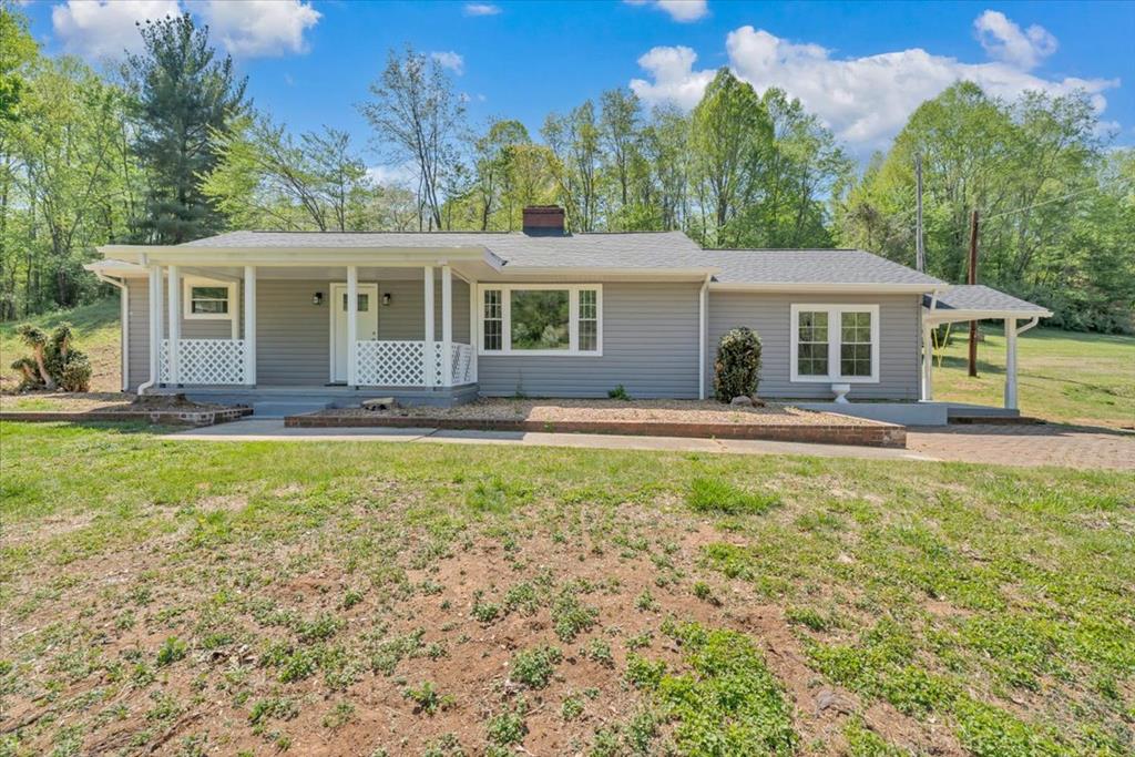 This home is not located in a flood zone. Flood insurance is not required. Completely remodeled home with main-level living on 4.74 acres at 112 Frankie Lane, Stuart, VA! Features a stunning new kitchen with granite counters, soft-close cabinets, and all-new appliances (microwave, dishwasher, fridge, range), plus custom-tiled bathroom and bright master suite filled with natural light. Major updates include new HVAC, new roof, updated electric, plumbing, and flooring. Enjoy refinished hardwood floors, new LVP, and extra attic storage. Outside, nearly 5 flat acres offer trout-stocked creek frontage, tons of garden space, new gravel driveway, and recent tree removal. Turn off US 58 onto Frankie Lane and cross the bridge at the bottom of the driveway.