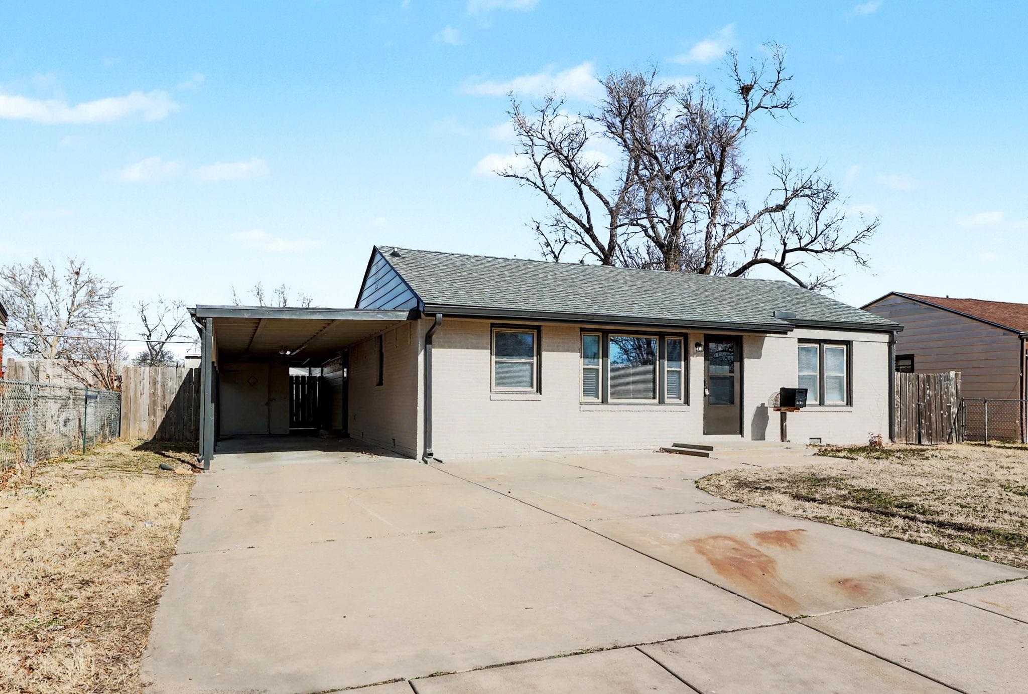 Step into this beautifully updated 4-bedroom, 2-bathroom home. Boasting nearly 2,100 square feet of living space, this residence has been meticulously updated from top to bottom, offering a perfect blend of modern style and functional comfort.  Chef's Kitchen: A stunning, updated kitchen featuring brand-new granite countertops, custom cabinetry, and new appliances.  Spacious Living: Enjoy an expansive layout with lots of space to spread out, ideal for both daily living and hosting guests.  Modern Bathrooms: Fully updated bathrooms with new vanities, toilets, and contemporary fixtures.  New roof, fresh interior and exterior paint, and all-new flooring throughout the entire home.  Located in Southwest Wichita, this home provides easy access to local amenities while offering a quiet retreat in a settled neighborhood. This home is truly a must see.  This is one of the larger homes in the area and it is move in ready!!!  Call listing agent today!!!
