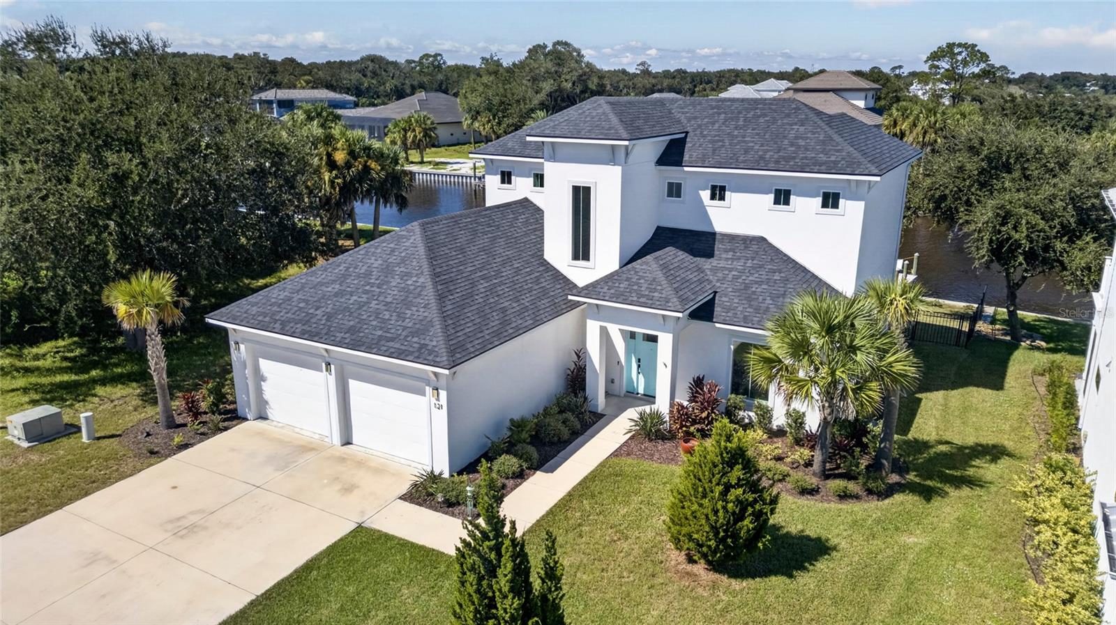 BOATER’S DREAM! PRIVATE 36-FOOT DOCK, 10,000-LB BOAT LIFT & JUST 90 SECONDS TO THE INTRACOASTAL WATERWAY! Welcome to 121 Seaside Point, a stunning 2023 custom-built waterfront residence in Seaside Landings, an intimate gated community in Flagler Beach, Florida. Situated on a saltwater canal, 900 feet from the Intracoastal, this exceptional property offers the luxury of keeping your boat in your own backyard, with a fully fenced yard and room for a pool!Offering over 2,500 square feet of beautifully designed living space, this 3-bedroom, 3.5-bath home blends coastal elegance, quality craftsmanship, and modern luxury. Thoughtfully designed with a private study featuring a separate entrance and an upstairs bonus room, the home offers exceptional flexibility for work, relaxation, and entertaining. Each bedroom features its own en-suite bathroom and walk-in closet, providing comfort and privacy for family and guests. Soaring ceilings, luxury vinyl plank flooring, hurricane-impact windows, and an abundance of natural light enhance the open-concept design, while expansive canal views create a beautiful backdrop throughout the main living areas.The gourmet kitchen is both elegant and functional, featuring custom cabinetry, fingerprint-resistant stainless-steel appliances, a double convection oven, an oversized island with storage, premium finishes, and a generous walk-in pantry. Overlooking the water, the adjoining living and dining areas creating an inviting setting for everyday living and entertaining.The first-floor primary suite is a private waterfront retreat, complete with serene canal views, a spa-inspired bathroom, and an oversized walk-in closet. Upstairs, the guest suites provide comfortable accommodations, while the versatile bonus room offers additional space for a media room, lounge, or private getaway. A dedicated secure safe room provides convenient storage for valuables.OUTDOOR LIVING AT ITS FINEST! The screened lanai overlooks a beautifully landscaped, fully fenced backyard with ROOM FOR A POOL!  Pool plans are available, offering the opportunity to create a spectacular private waterfront oasis. Enjoy outdoor entertaining, peaceful canal views, and beautiful Florida sunsets. A convenient outdoor shower with hot and cold water adds the perfect finishing touch after a day on the boat.THE BEST OF BOTH WORLDS! BOATING AND BEACH LIVING! Seaside Landings offers direct access to the Intracoastal Waterway while being just 4 miles (approximately 7 minutes) from the beautiful beaches of Flagler Beach. Enjoy nearby waterfront dining, local restaurants, shopping, and the relaxed coastal charm that makes this area so special.From its exceptional boating amenities and thoughtfully designed custom interior to its gated setting and proximity to the beach, 121 Seaside Point offers a rare opportunity to embrace the Florida waterfront lifestyle.YOUR BOAT IN YOUR BACKYARD. YOUR NEXT ADVENTURE JUST 90 SECONDS AWAY!