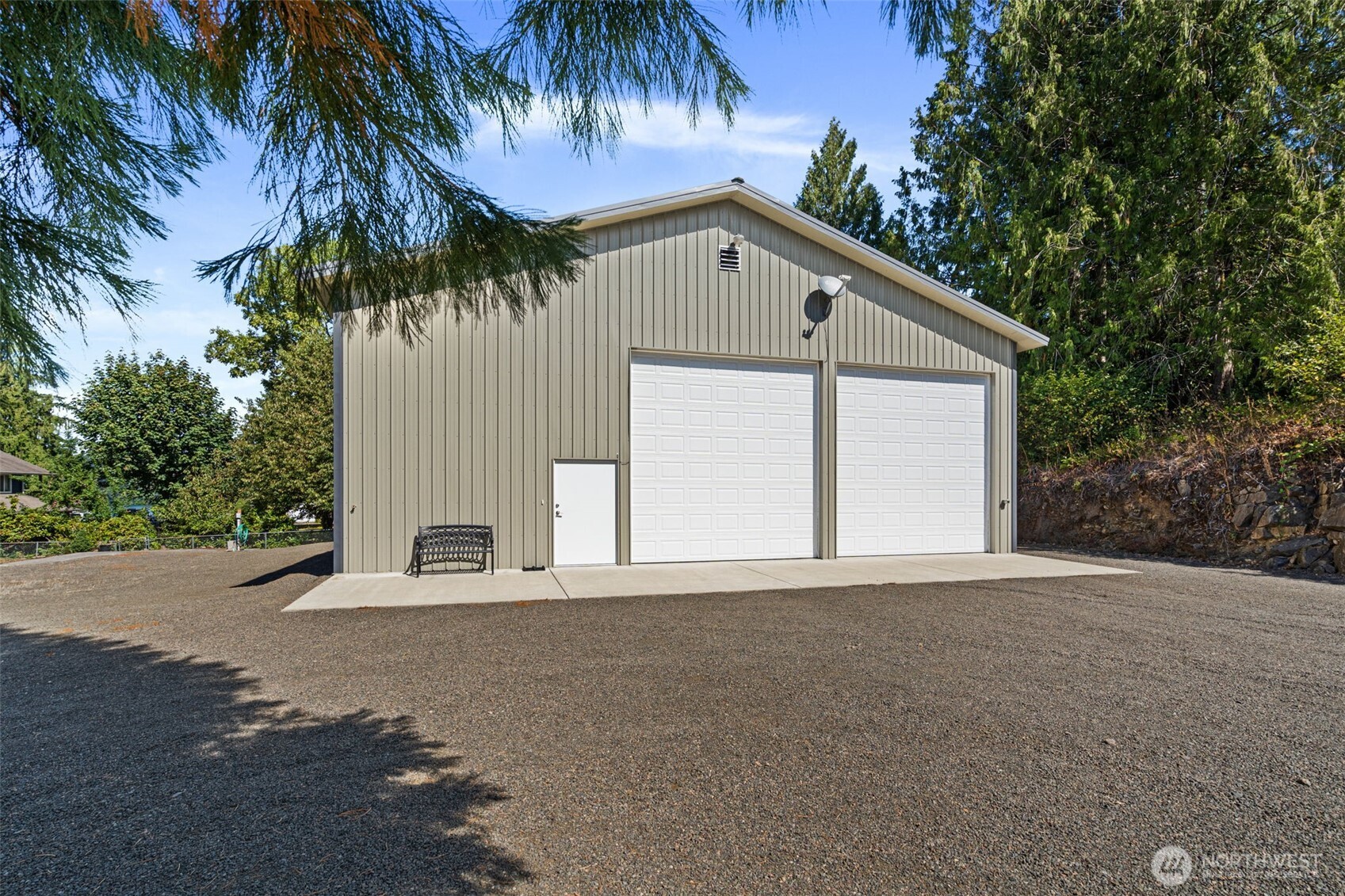 Unmatched versatility meets prime location on just over 1/3 acre, under 1/2 mile from Mayfield Lake Park & boat launch! This unique property features a comfortable 1-bedroom apartment with a spacious bonus room,  large dedicated office, and 2 bathrooms complete with large walk in showers, integrated with a heavy-duty steel-sided shop built for year-round recreation, boating, fishing, and nearby hunting. Connected to a 4-bedroom septic system with space and ready to build more. The immaculate shop features a separate workshop equipped with workbenches and pre-installed air bibs for your tools (just add compressor). It also offers full indoor parking for all your vehicles, boats and even an RV (complete with water, septic, & power hookups). And to top it off there are additional exterior water, power, and septic hookups ready for guests or extra RVs. Whether seeking a low-maintenance live/work base, an investment retreat, or the ultimate lake-life staging ground, this turnkey property offers endless possibilities!