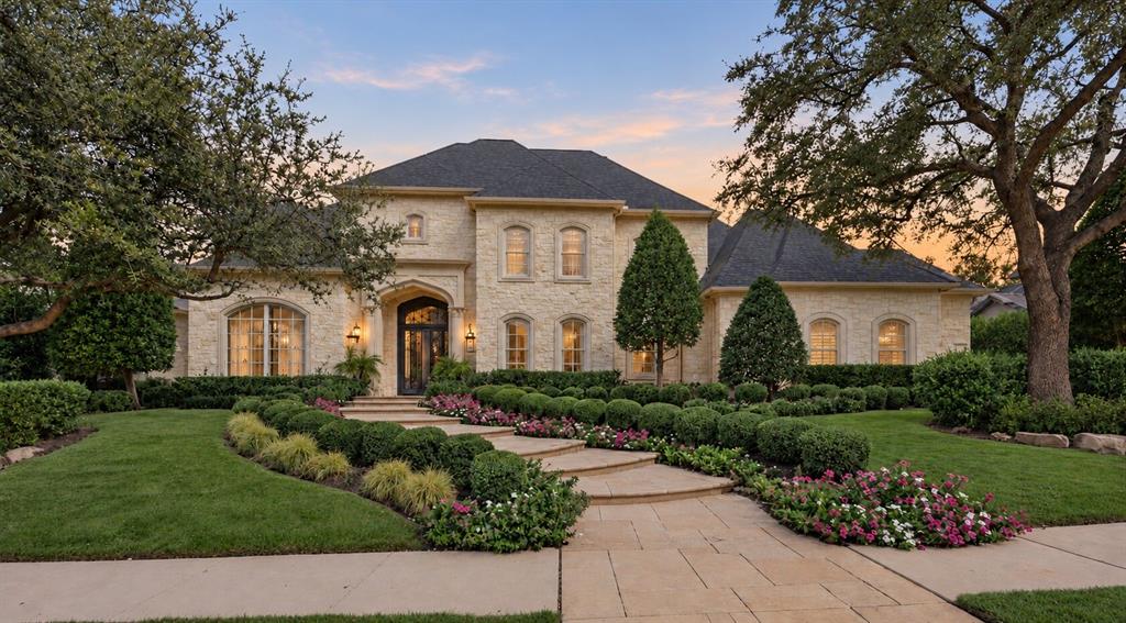Experience timeless elegance and exceptional craftsmanship in this stunning custom estate by Steve Roberts Luxury Homes, located in the prestigious, guard-gated Starwood community of Frisco. Situated on nearly half an acre, this impressive residence offers 7,371 square feet of thoughtfully designed living space with 5 bedrooms, 5 full baths, 1 half bath, and a 3-car garage. A grand curved staircase, soaring ceilings, expansive windows, and beautiful architectural details create an unforgettable first impression. This home exudes quality, incredible scale and finishes not found in many homes. The spacious floor plan features multiple living and dining areas, three fireplaces, and generously sized bedroom suites, each with a private bath and walk-in closet. The chef's kitchen is designed for entertaining with two islands, quartzite countertops, custom cabinetry, a Wolf gas range, double ovens, built-in refrigerator, and a walk-in and butler's pantries. Two bedrooms downstairs provide flexible living arrangements, while three additional suites upstairs offer privacy and comfort. A few special features include the Savant whole home sound system (2026), wireless switches (2026), and security system with camera coverage (2026). Step outside to a true backyard retreat featuring a fully renovated pool and spa with water feature, covered patio with hidden motorized screens, and built-in grill. The backyard offers incredible privacy as the home sits on a bluff far above the adjacent homes. A whole-house generator system provides security in case of a power loss (2025). Residents of Starwood enjoy access to community amenities including a clubhouse, pool, walking trails, and gated security. Conveniently located near the Dallas North Tollway, shopping, dining, and entertainment, this exceptional property combines sophisticated design, generous living spaces, and an outstanding Frisco location. AGENT TO MEET- Call ShowingTime to schedule the appointment.