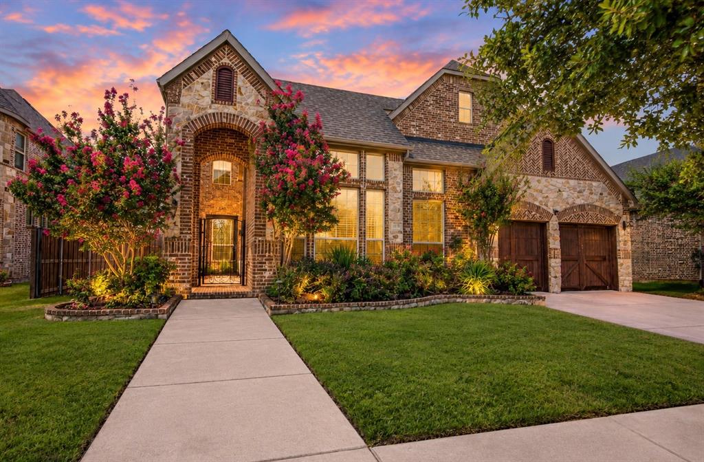 Discover exceptional luxury and effortless living in the highly sought-after Viridian community. Spanning over 4,300 square feet, this stunning 5-bedroom, 4-bathroom traditional home offers an impeccably designed open floor plan tailored for both grand entertaining and quiet relaxation.     The main level welcomes you with beautiful natural light, sprawling high ceilings, and a dedicated executive office. At the center of the home is a chef-inspired gourmet kitchen featuring striking granite countertops, a large center island, a gas range, and a walk-in pantry. The kitchen flows seamlessly into the main living area, creating an inviting space to host family and friends. The first floor luxurious primary suite is a true private retreat boasting a spa-like ensuite bath with separate vanities, a walk-in shower, and an expansive walk-in closet. A secondary first-floor bedroom offers excellent flexibility for overnight guests.     Upstairs, the home continues to impress with three additional bedrooms (each with its own walk-in closet), a dedicated media room, and a sprawling second living area perfectly suited for a game room.     Step outside to find your own resort-style backyard oasis shaded by mature magnolia trees. The incredible outdoor living space features a covered patio with a beautiful pergola, a fully equipped built-in outdoor grill station, and a sparkling heated saltwater pool and spa combo—ready to be enjoyed year-round.     Complete with a 3-car tandem garage and a tankless water heater, this home lacks nothing. Positioned in the Hurst-Euless-Bedford ISD and just a short walk to Viridian Elementary, neighborhood parks, scenic lakes, tennis courts, and resort-style community pools, this property delivers a lifestyle of absolute prestige.