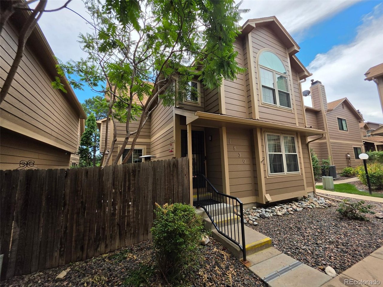 Welcome to this spacious two-story home in Deer Pointe Village! The open main level features beautiful wood flooring, a cozy fireplace, and a functional kitchen with oak cabinetry, roll-out shelving, tile countertops, a pantry, and space for a breakfast nook or home office. Upstairs, the generous primary suite offers ample closet space and a private bathroom with a soaking tub and skylight. Enjoy outdoor living on the deck overlooking the private backyard. Conveniently located near shopping, dining, schools, parks, and major roadways. This inviting home is ready for its next owner-schedule your showing today!