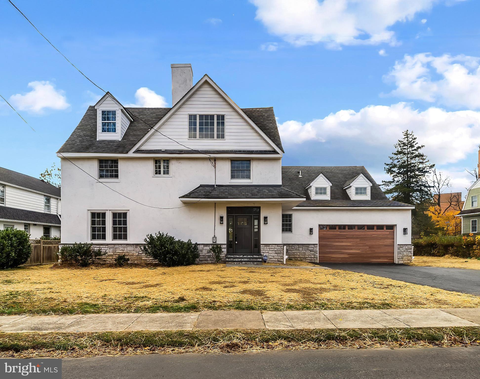 Welcome to your dream home! This fully renovated 6-bedroom, 3.5-bath residence offers an impressive 4,000+/- square feet of refined living space, ideally located in a prime neighborhood close to top-rated schools, shopping, dining, and major commuter routes.From the moment you step inside, you'll be captivated by the open layout, abundant natural light, and high-end designer finishes throughout. The show-stopping kitchen features quartz and soapstone countertops, custom cabinetry, and stainless-steel appliances—perfect for hosting or everyday living.The first-floor master suite provides a luxurious retreat with a beautifully updated en-suite bath and ample closet space. Upstairs, five spacious bedrooms offer flexibility for guests, a home office, or multi-generational living.This home includes three fully remodeled bathrooms plus a stylish half bath, all featuring modern fixtures and tilework. Thoughtful updates throughout—new flooring, lighting, paint, and trim—ensure a true move-in ready experience.With its generous square footage, luxury finishes, and unbeatable location, this home is a rare find. Don’t miss the opportunity to make it yours!