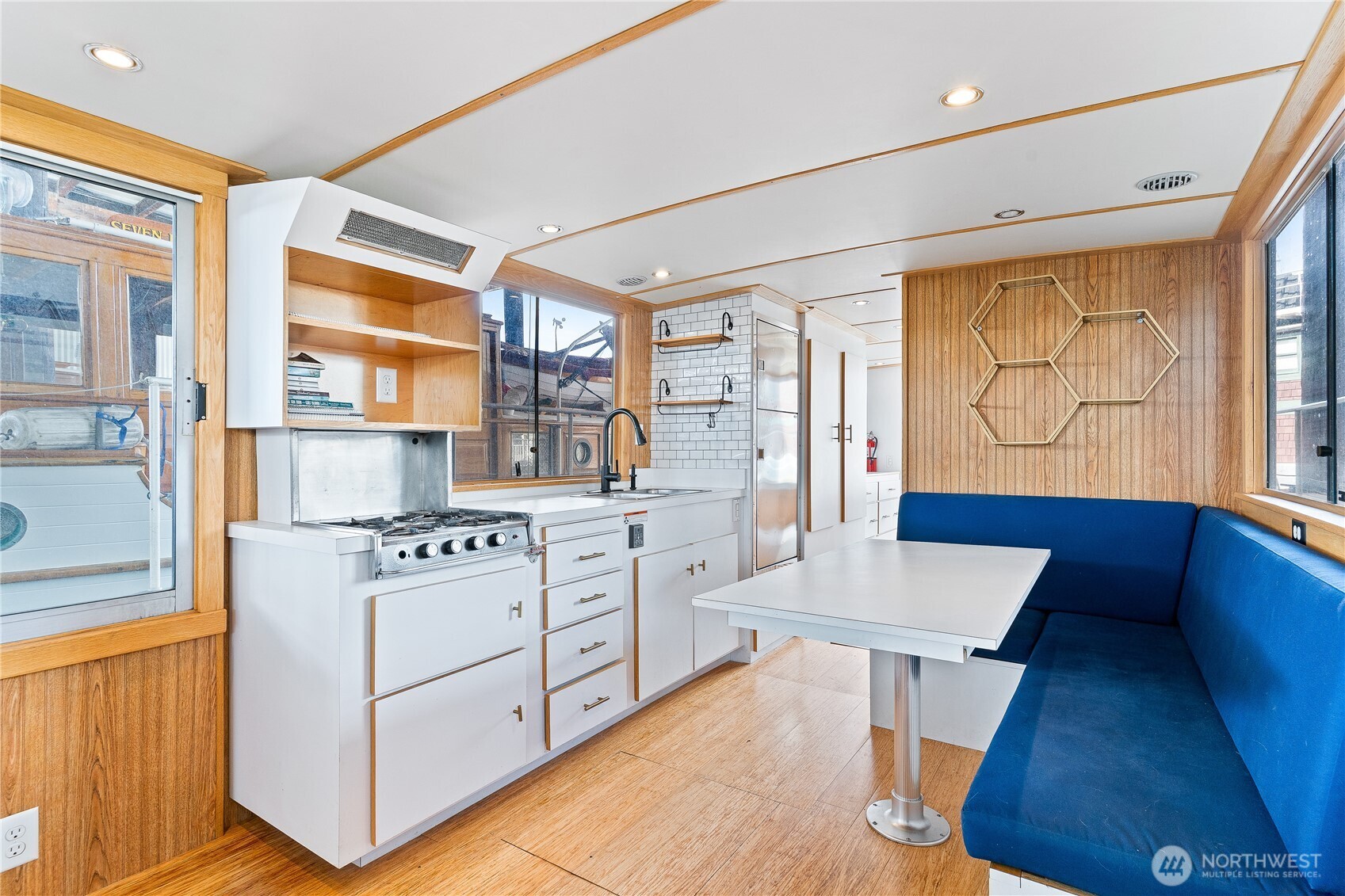 Ever imagined living on the water without the million-dollar price tag? This Cruise-a-Home in Seattle Marina delivers the floating lifestyle with comfort, convenience, and iconic views of the Space Needle. Inside you’ll find two sleeping areas, a cozy kitchen with a sitting nook, and spacious decks for year-round enjoyment under the covered slip. The gated marina offers charm, security, and off-street parking. Moorage is $760 plus utilities, with a 250-gallon fuel tank, 150-gallon water tank, and 76-gallon waste tank. All this just minutes from grocery stores, the University of Washington, shopping, and more. Schedule a tour today and see why this is more than a home—it’s an experience.