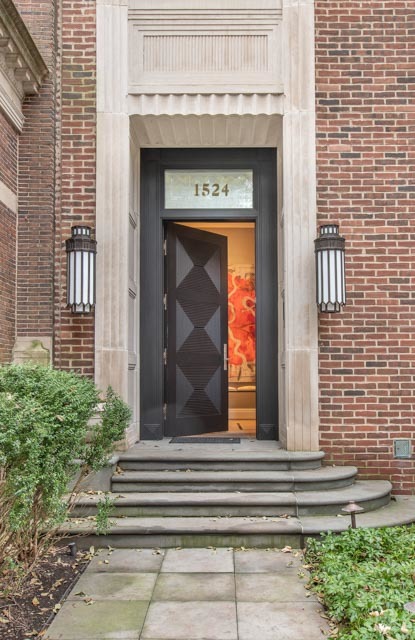 A rare architectural offering on one of Chicago's most coveted residential streets, this is the northernmost home on Astor, distinguished by its commanding position and oversized windows overlooking the Cardinal's Mansion and Lincoln Park. The setting provides exceptional privacy and natural light, a rarity in the city.    Originally designed as a mid century modern residence by noted Chicago architect I. W. Colburn, the home was later completely reimagined with a refined Art Deco inspired interior by two of the city's most respected design firms, Marvin Herman & Associates and Suzanne Lovell Inc. In 2025, the exterior was extensively renovated, including all new stucco on the walls enclosing the home's expansive private terrace.    Today, the residence offers approximately 6,500 square feet of beautifully finished living space, generous outdoor areas, and two-car garage parking. Interior finishes are of exceptional quality and include bespoke millwork and cabinetry, hand-cast plaster moldings, a dramatic curved staircase with artisan-fabricated bronze and steel balusters, three distinctive fireplaces, rift-sawn white oak floors with custom inlay, limestone and marble, Donald Kaufman paint finishes, and vellum wall coverings.    An elegant foyer with a walk-in coat closet, climate-controlled wine storage, and a guest bath with a hand-carved marble sink introduces the home. One level up, the main living level includes a gracious living room with a wet bar, a separate dining room, and a sophisticated kitchen with custom cabinetry and a built-in banquette. This level also includes a private office with a white alabaster fireplace and direct access to the terrace.    A standout feature of the home, the north-facing terrace offers a serene setting for outdoor dining and entertaining.    The top level includes a luxurious primary suite with a spa caliber bath featuring a soaking tub carved from a single block of Noir St. Laurent marble with P. E. Guerin hardware. A second en suite bedroom and a family room with an additional full bath complete the level.    Curved rear stairs lead to a private bedroom suite with its own entrance, allowing guests to enter independently. Features include knotty pine paneling, a kitchenette, generous closets, an en suite bath, and French doors opening to a tranquil koi pond. The landscaping was designed by award-winning Scott Byron & Co.    Ideally located near Lincoln Park, the lakefront, and downtown, this exceptional Gold Coast residence offers architectural pedigree, remarkable privacy, and extraordinary craftsmanship.