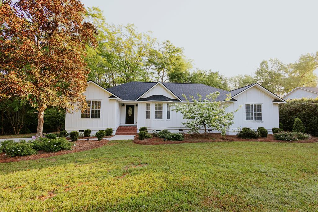 Charming Traditional Home with Pool Near Glen Arvin Country Club!  Welcome to 2101 Hollywood Drive — a beautiful one-story home offering 1,917 square feet of comfortable living in one of Thomasville's most desirable areas. Built in 2000, this classic home features charming wood board-and-batten siding, four spacious bedrooms, and an inviting layout perfect for everyday living.  Enjoy outdoor living at its best with a sparkling pool and fenced backyard — ideal for relaxing or entertaining friends and family. Conveniently located near Glen Arvin Country Club and just minutes from downtown Thomasville's shops and restaurants, this property combines charm, location, and lifestyle in one perfect package.