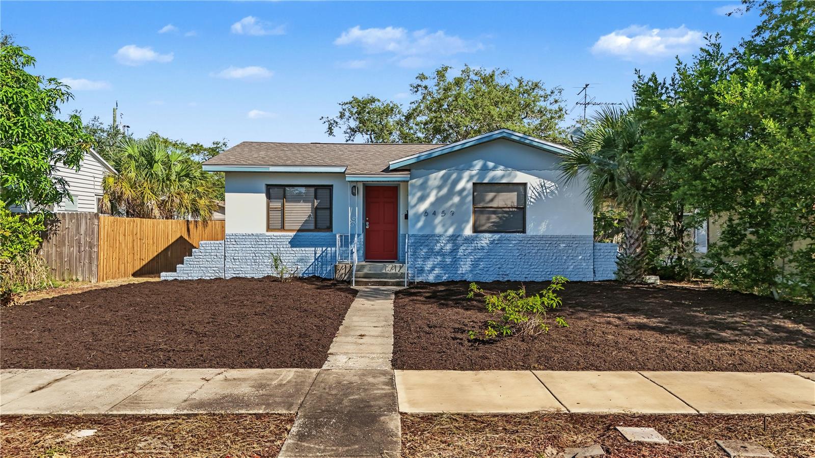 Find your place in St. Pete with this 2-bedroom, 1-bath single-family home featuring hardwood floors, a spacious kitchen with ample cabinetry, vaulted ceilings and skylights that fill the space with natural light. The dining area features a distinctive pitched ceiling and French doors opening directly to the backyard, creating an easy connection between indoor and outdoor living. A 1-car garage and large fenced backyard with rear alley access offer added flexibility for parking, storage, or outdoor entertaining. Conveniently located near local parks, shopping, dining, and entertainment, with St. Pete Beach, the Gulfport waterfront, and Central Ave’s shops and restaurants all within reach. Enjoy easy access to popular destinations, including Tyrone Square, the St. Pete Pier, and downtown St. Petersburg. With its character, natural light and convenient location, this home is ready for its next chapter. Schedule your showing today!