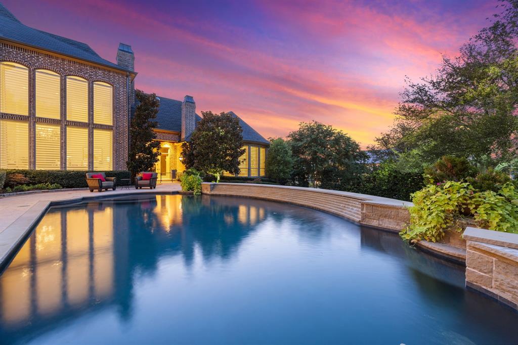 Nestled in an exclusive gated enclave, this extraordinary estate embodies elegance, sophistication, and refined living. Spanning over 8,600 square feet, the home masterfully blends visionary design with exceptional architecture. Boasting 5 spacious bedrooms and 7 luxurious baths, the layout is thoughtfully designed for both grand entertaining and intimate living. The first floor features a state-of-the-art theater room and an expansive wet bar that seamlessly connects to a custom wine cellar—ideal for hosting unforgettable gatherings. The gourmet kitchen is a chef’s dream, showcasing exotic granite countertops, bespoke cabinetry, and top-of-the-line Miele appliances. Upstairs, an oversized game room with a secondary wet bar offers the perfect setting for recreation and relaxation. Outside, lush, manicured landscaping ensures total privacy while creating a serene backdrop for the heated pool and spa—a true resort-style escape. Every inch of this estate has been meticulously updated, including designer lighting, a curated color palette, rich hardwood flooring, custom shades, and striking marble fireplaces. The primary suite is a sanctuary unto itself, with a completely remodeled spa-inspired bathroom and a boutique-style walk-in closet. This home is the ultimate expression of luxury living—flawlessly finished and ready to impress. The furnishings and artwork throughout the home are the epitome of elegant living, curated to complement the home's sophisticated ambiance. If you're seeking a property as unique and individual as you are, look no further—this is the one.  
The Golf Club at Twin Creeks is home to an award-winning Arnold Palmer Signature Golf Course that offers a premier golfing experience for players of all skill levels. Surrounded by Twin Creeks a premier golf courses in Texas, which provides an exceptional blend of challenging play, world-class amenities, and outstanding service. Easy access to Legacy West, Stonebriar Country Club, The Star at Frisco.
