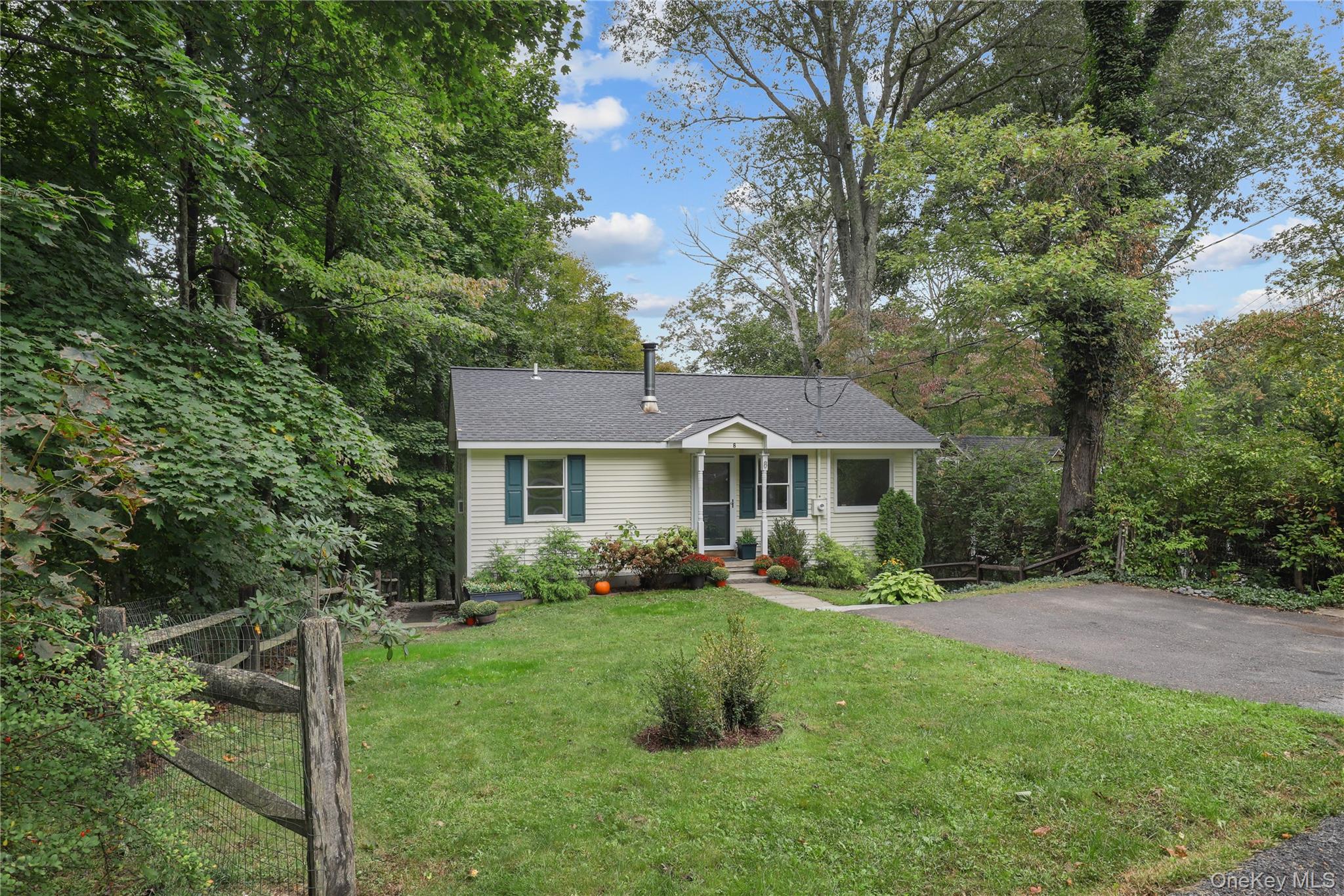 Built in 1990, this relatively young 2BR Lake Kitchawan cottage offers great functionality, western-facing seasonal lake views and award-winning Katonah-Lewisboro schools!  Enjoy easy one level living with a bright first-floor kitchen offering deck access for morning coffee or sunset cocktails, a comfortable living room, two nicely-sized bedrooms and a full bathroom.  The walk-out lower level is spacious and provides flexible open space with a half bath, laundry, lots of storage and utilities.  Lake Kitchawan members enjoy a community clubhouse, sandy beach with swimming, picnic/BBQ facilities, playground and a lakeside dock for non-motorized boats. Ideally located near the charming towns of Ridgefield and New Canaan, CT and just steps from the Leon Levy Preserve trailhead. 20 minutes to Katonah, 30 minutes to downtown Stamford and only 50 miles away from NYC, this home is a wonderful alternative to condo living providing more freedom and connection to nature.
