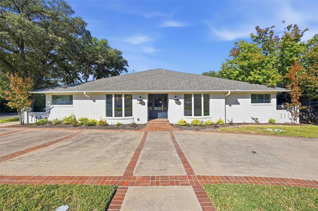 Welcome to this stunning 4-bedroom, 3-bath residence situated on an expansive corner lot in the highly sought-after Lakewood Elementary district. The grand living area impresses with vaulted ceilings, a custom fireplace, and a seamless flow into the versatile game room—perfect for entertaining or relaxing. The gourmet kitchen features a spacious island, quartz countertops, premium appliances, a large walk-in pantry, and abundant natural light. The luxurious primary suite offers a spa-inspired bath with a soaking tub, separate shower, and generous walk-in closet, while secondary bedrooms also include sizable walk-in closets for ample storage throughout. Step outside to a private backyard with a sliding electric gate—ideal for outdoor living and gatherings. Recent updates include newer windows and a tankless water heater, ensuring this home is move-in ready and built for modern comfort. Conveniently located near White Rock Lake, premier shopping, dining, and major highways, this home combines style, comfort, and an unbeatable location. Don’t miss this fabulous opportunity!