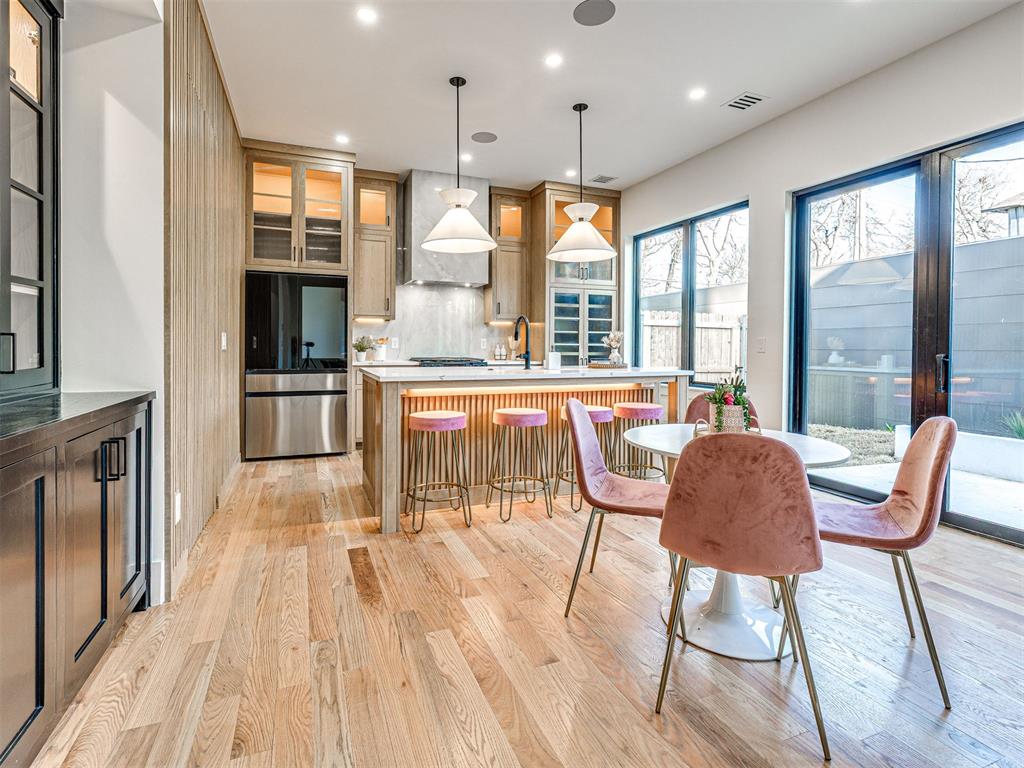 Experience elevated urban living in this stunning new-construction home just minutes from the Plaza District. Designed with modern style and effortless functionality, this three-story residence offers 3 bedrooms, 3.5 baths, a private office with closet, multiple living spaces, and an incredible rooftop terrace.The main level features an open, light-filled layout with a spacious living room, custom built-ins, modern fireplace, expansive windows, and double glass doors connecting to the outdoors. The designer kitchen showcases white oak cabinetry, quartz countertops, a gas range, under-cabinet lighting, hardwood floors, and a hidden walk-in pantry with a coffee bar and microwave. The adjacent dining area is perfect for everyday living or entertaining.Upstairs, the luxurious primary suite features a spa-inspired bath with soaking tub, dual vanities, and a walk-in shower with dual shower heads, plus a generous walk-in closet. A private coffee bar with mini fridge adds an extra touch of convenience. This level also includes an office, guest bedroom with walk-in closet, full bath, and oversized laundry room with folding space.The third floor offers a second living area, private guest suite, and spectacular rooftop terrace complete with an outdoor kitchen, sink, and mini fridge—perfect for entertaining while enjoying sweeping city views.Additional highlights include Pella windows and doors, TPO roofing, quartz throughout, designer tile, surround sound, smart-home features, and a two-car garage. Located close to the Plaza District’s dining, shopping, entertainment, and nightlife, this exceptional home delivers sophisticated design and an unbeatable urban lifestyle.