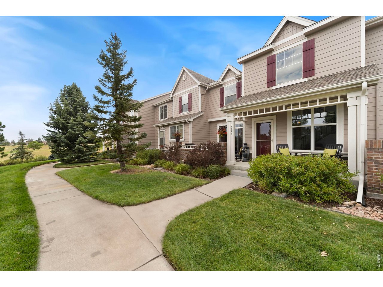 Welcome to this beautifully maintained townhome in the desirable Hunter's Run community, ideally located on the west side of Loveland. Step inside to an inviting open-concept main level featuring soaring vaulted ceilings, hardwood flooring, updated lighting, and a thoughtfully remodeled kitchen with granite countertops, stainless steel appliances, and ample cabinet space. The dining area seamlessly extends to a private patio, creating the perfect setting for morning coffee or relaxing evenings outdoors. Upstairs, an expansive primary suite offers a peaceful retreat with a generous walk-in closet and five-piece bath featuring tile flooring and a beautifully tiled shower. The versatile loft provides flexible living space that can serve as a home office, second living area, reading nook, or playroom. A second full bathroom offers convenient privacy for the additional upstairs bedroom.The unfinished basement provides abundant storage and workout space, along with exciting potential for future expansion. With rough-in plumbing already in place for an additional bathroom, it's ready for your personal vision. The oversized attached garage includes a convenient bump-out, offering even more room for storage, tools, or recreational equipment. Hunter's Run offers an exceptional lifestyle with outstanding neighborhood amenities. Enjoy easy walks to nearby Mehaffey Park, cool off at the private community pool during the summer months, and take advantage of the home's convenient location just a short drive from Estes Park and the gateway to Rocky Mountain National Park. Combining comfort, flexibility, and an unbeatable location, this move-in-ready townhome is one you won't want to miss.