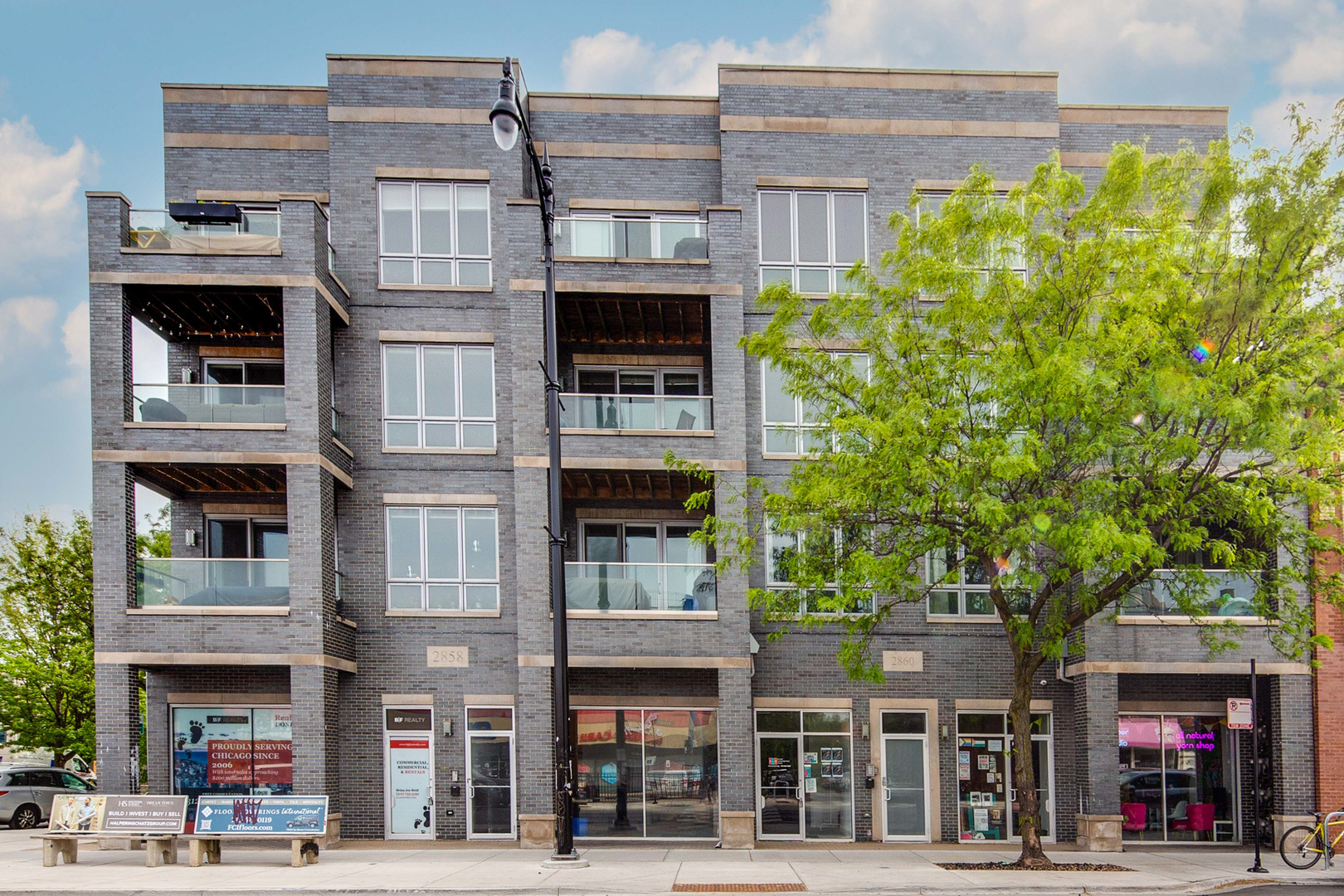 Welcome to this spacious and stylish 3-bedroom, 2-bath condo located just north of the Logan Square El stop-right in the heart of one of Chicago's most vibrant neighborhoods! This bright and airy home features an open-concept layout that seamlessly blends the living, dining, and kitchen areas, centered around a sleek, oversized island perfect for entertaining. A dramatic northeast-facing wall of windows floods the living room with natural light and leads to a private balcony-ideal for grilling, relaxing, or enjoying indoor/outdoor gatherings. The primary suite boasts a large walk-in shower and modern finishes, while two additional bedrooms offer flexible space for guests or a home office. Enjoy the convenience of in-unit laundry, ample storage, and an attached garage. As a bonus, a shared rooftop deck offers sweeping views of the city skyline. Steps to the Blue Line, incredible restaurants, coffee shops, boutiques, and more-this is Logan Square living at its best!