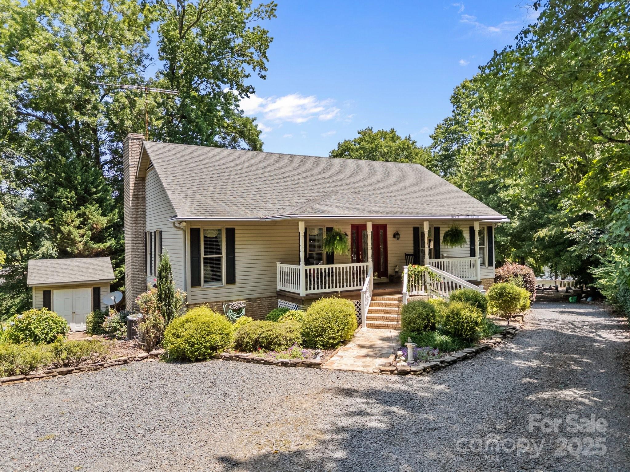 114 Mallard Point Mount Gilead NC, on Lake Tillery, is a gorgeous home you are not going to want to miss seeing.  Located in the gated community of Woodrun, this pristine home has everything you want in lake home-a great open floor plan,  3 bedrooms and 3 full baths, living space upstairs and down, approximately 200 feet of prime waterfront on a point lot, an oversized boathouse with upper deck with 2 boat slips and a sliding board, a stone patio on the waterfront with a hot tub, stone pathways and retaining walls, mature landscaping with an irrigation system, a spacious screened porch upstairs, open and covered patios off the living space in the basement, main channel views, and many other special touches you just have to experience by scheduling an appointment.  The basement garage space is heated and cooled. An outside shed provides additional storage. The Woodrun community has a clubhouse, swimming pool, tennis courts, walking trails and many community activities.