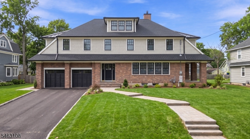 Spectacular 6-bedroom, 5.5-bath brick & Hardy Plank clap boards & shakes Colonial, completely renovated to blend timeless architectural character w/modern amenities. Offering 4 finished levels of living space, this exceptional home features kitchen that would thrill any master chef, including a beautiful butler's pantry, an inviting open side porch accessed from the living room & a covered 2nd-floor porch accessible from the 5th bedroom/office. The impressive family room showcases a dramatic cathedral beamed ceiling + fireplace creating a warm & distinctive gathering space. The spacious primary suite w/2 windowed enormous closets + luxurious private bath. The finished attic offers an additional bedroom, full bath & recreation room, while the finished basement provides even more flexible living & entertaining space. Additional highlights include oversized garage w/charming bay window, beautifully renovated interiors & thoughtful updates throughout. The home's generous proportions, unique architectural details & versatile layout provide exceptional space across all levels. Ideally located less than a mile from the train station + just blocks from all schools, this residence offers a rare opportunity to enjoy the elegance, craftsmanship & character of a classic home while benefiting from the comfort, functionality & conveniences of modern living. Truly a one-of-a-kind property combining history, space, style & outstanding location. An exceptional home in a truly special setting.