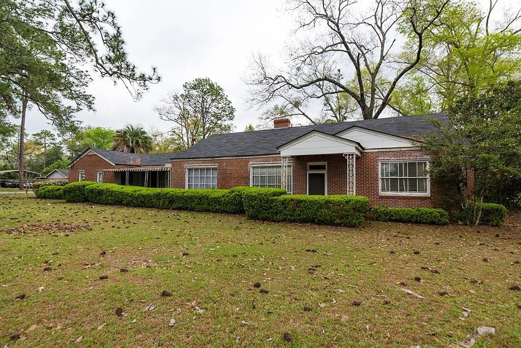 Charming Fixer-Upper in a Sought-After Neighborhood! Step into a world of possibilities with this spacious one story 3-bedroom, 2-bathroom ranch, perfectly situated in a friendly and vibrant community. This home has beautiful hardwood floors throughout; also has large rooms all over this home. The bathrooms have beautiful, checkered black and white tile. There is a massive office gameroom/office This property is ideal for those looking to invest in their future or create a personalized haven. Although it requires some cosmetic updates; The large living room welcomes you with abundant natural light, offering a cozy atmosphere for relaxation or entertaining. Imagine updating the flooring and freshening up the paint to create a modern yet inviting space. Home is minutes away from shopping and the new Publix! Don't miss this great opportunity; hurry this deal will not last!Bring an Offer!!!! Price Reduced!!!