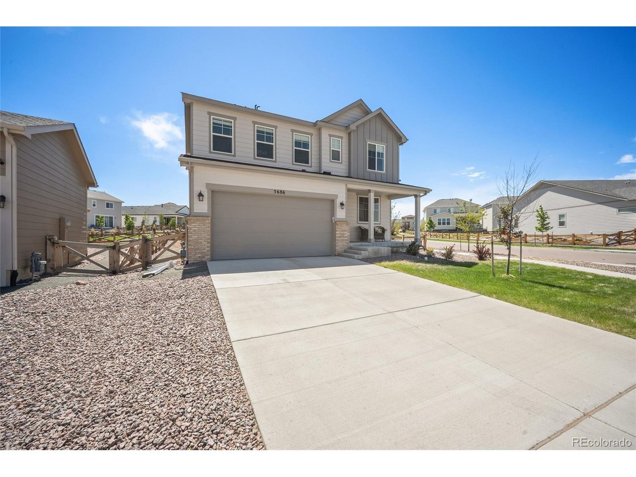 Welcome to this exceptional two-story residence in the highly sought-after Banning Lewis Ranch community, where moderncomfort meets refined living. Perfectly positioned on a premium corner lot, this beautifully maintained home offersoutstanding curb appeal with lush landscaping and a fully fenced backyard designed for both privacy and enjoyment. Thecovered patio creates the ideal outdoor retreat for relaxing evenings or effortless entertaining. Adding even more value, abrand-new park is currently being developed directly across the street, offering convenient access to future recreation andgreen space. Step inside to discover a bright, open-concept floor plan enhanced by gorgeous wood laminate flooringthroughout the main level. The spacious great room is anchored by a stunning gas fireplace, creating a warm andsophisticated focal point for everyday living. Expansive sliding glass doors invite abundant natural light while seamlesslyconnecting the indoor living space to the outdoor patio. The gourmet kitchen is thoughtfully designed for both functionalityand style, featuring a substantial center island, elegant solid stone countertops, and abundant prep and storage space-perfect for entertaining, gathering, and daily living. Upstairs, this home offers 3 spacious bedrooms, 3 bathrooms, and aversatile loft that can easily serve as a home office, media room, playroom, or additional lounge space, adapting beautifullyto your lifestyle needs. Meticulously cared for and in like-new condition, this move-in-ready home showcases pride ofownership throughout. Ideally located near the vibrant Powers Corridor, residents enjoy convenient access to premiershopping, dining, and everyday amenities. This is an incredible opportunity to own a beautifully appointed home in one ofColorado Springs' most desirable master-planned communities.