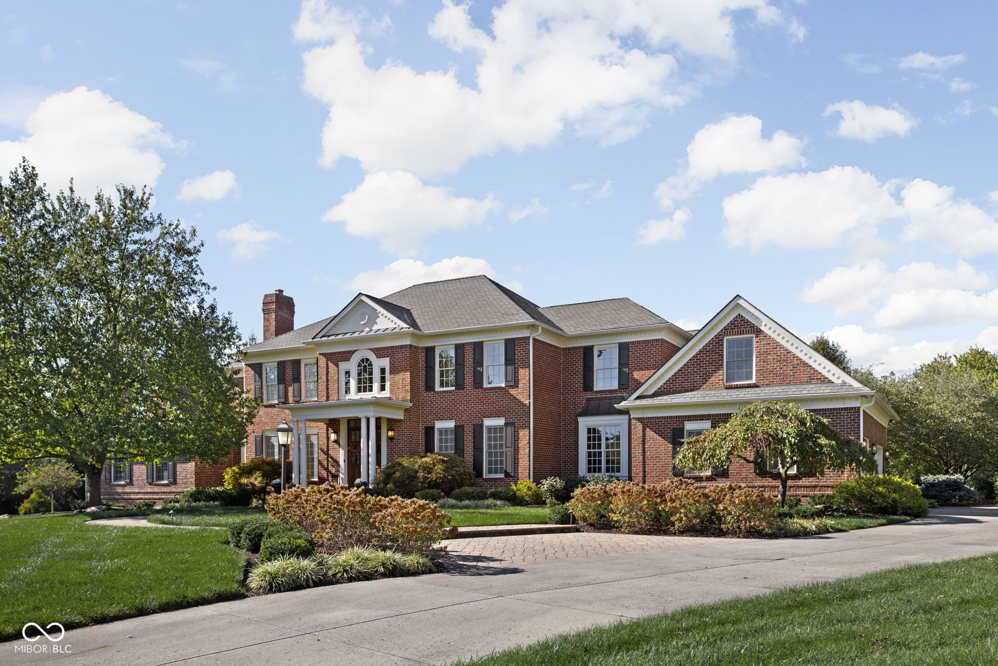 CUSTOM. STATELY. Exceptional QUALITY. Beautifully APPOINTED. Quiet CUL-DE-SAC. Main-level PRIMARY WING.  PRIMARY/IN-LAW Quarters on Upper. Private 1.46 AC Lot. Indoor to outdoor living design. Saltwater sport POOL + POOL HOUSE. XL VERANDA with FP, TV, surround, radiant heaters, fans. And the list could go on-and-on. Once in awhile a special property comes along, and this is THAT HOME, in Zionsville. 5 Bedrooms, 7 baths, a dedicated home-office area, plus an abundance of extra special features & amenities seldom found in one property! PUB STYLE BASEMENT offers recreation, wet-bar, lounge area, wine tasting, home theater,  exercise room, and walk-out access to resort-like features. This is a must-visit property!  Clifden Pond is conveniently located off Hunt Club Rd with quick access to main arteries into (and out of) the City. Also... a quick bike/walk/golf cart to the Village, Rail Trail, and all things Zionsville!