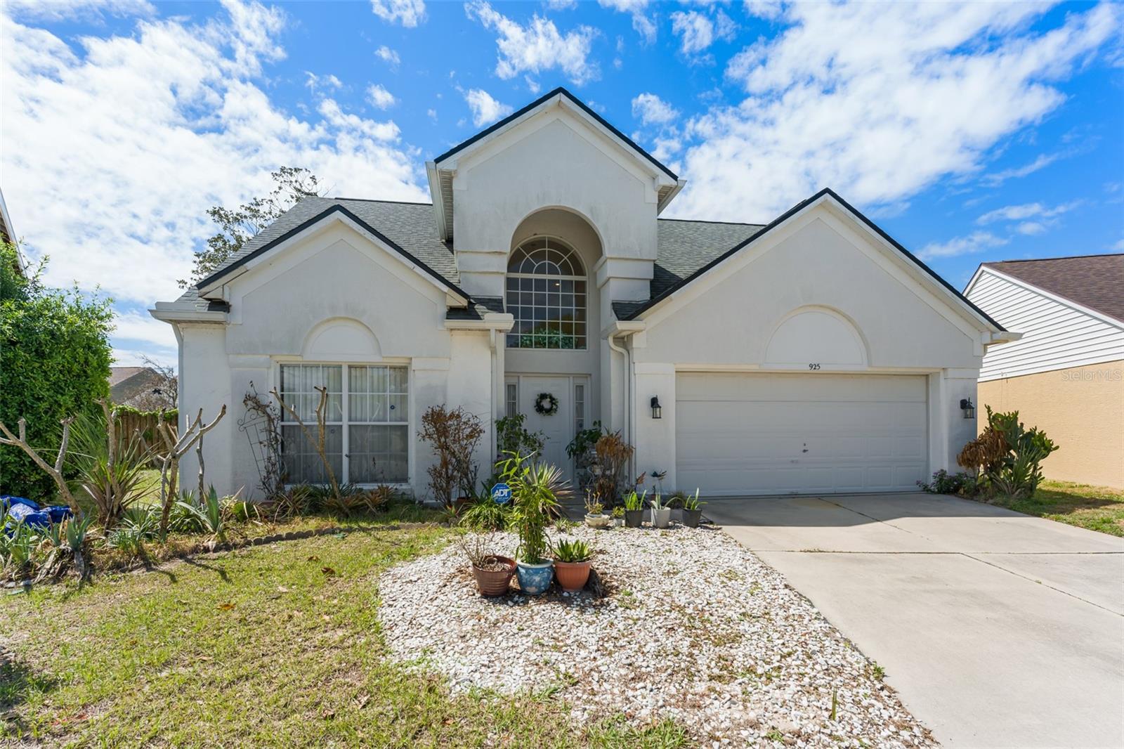 INCREDIBLE LOCATION!  Enjoy this 3/2.5 Lake Mary community of The Crossings, within the sought-after Colony Cove. * Roof replaced 2023 * Water Heater replaced 2024 * Disposal replaced 2026 * Gutters replaced 2023 * This home offers the perfect blend of comfort, style, and everyday convenience. Step inside to discover a bright and inviting layout designed for both relaxing and entertaining. * DOWNSTAIRS PRIMARY SUITE * SPACIOUS KITCHEN * LARGE LIVING & DINING AREAS * ABUNDANT LIGHT * The kitchen offers ample cabinetry, generous counter space, and a functional layout. Adjacent living spaces create a warm, open atmosphere perfect for gatherings or quiet evenings at home. The primary suite provides a peaceful retreat with a well-appointed ensuite bath large and walk in closet. Additional upstairs bedrooms are generously sized - ideal for guests, a home office, or growing households.  You'll appreciate the large closet upstairs for additional storage.  Enjoy Florida living year-round with a private outdoor space perfect for entertaining, gardening, or simply unwinding in the sunshine. Residents of Colony Cove enjoy access to The Crossings community amenities, which include a pool, parks, playgrounds, walking trails, and recreational areas. Located minutes from shopping, dining, major highways, I-4.  This is a wonderful opportunity to own a home in one of Lake Mary’s most established and desirable communities - come and see all that this wonderful home has to offer!