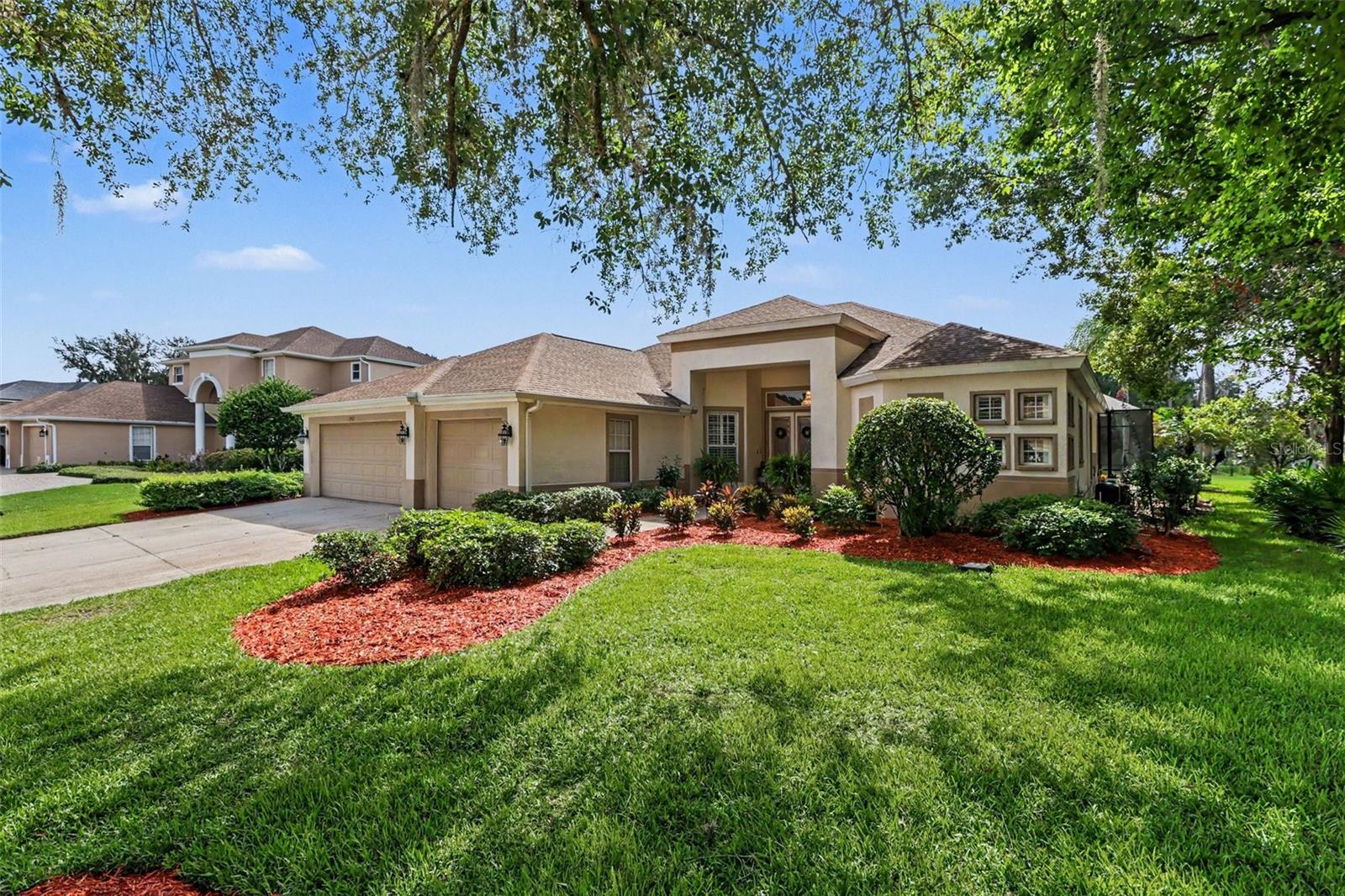 Welcome home to this Beautiful, Elegant, Updated home located in Hampton Place, the exclusive gated section of Walden Lake. Upon entering the front door, you are immediately drawn to the view of the pool and large backyard. Travertine marble flooring flows thru the formal areas into the Great Room and kitchen. Beautiful chandelier, tray ceiling and crown molding accent the formal dining area. The open Great Room which overlooks the pool features a custom-built entertainment center. The kitchen was updated with new granite countertops, top of the line appliances and light fixtures. Elegance radiates in the Owners Retreat with crown molding and custom built in closets. Beautiful In-Suite bathroom features double vanities with new granite countertops, garden tub and separate shower and new fixtures. The separate Guest Suite also has an In-Suite bathroom with new granite top and fixtures. One secondary bedroom has direct access to a full bath. Double doors open to the office which has travertine marble flooring. Enjoy great Florida living outside in the oversized screened lanai area that includes a custom built in grill, saltwater pool and spa and overlooks a beautiful back yard. A private well is used to irrigate the lawn and shrubs.