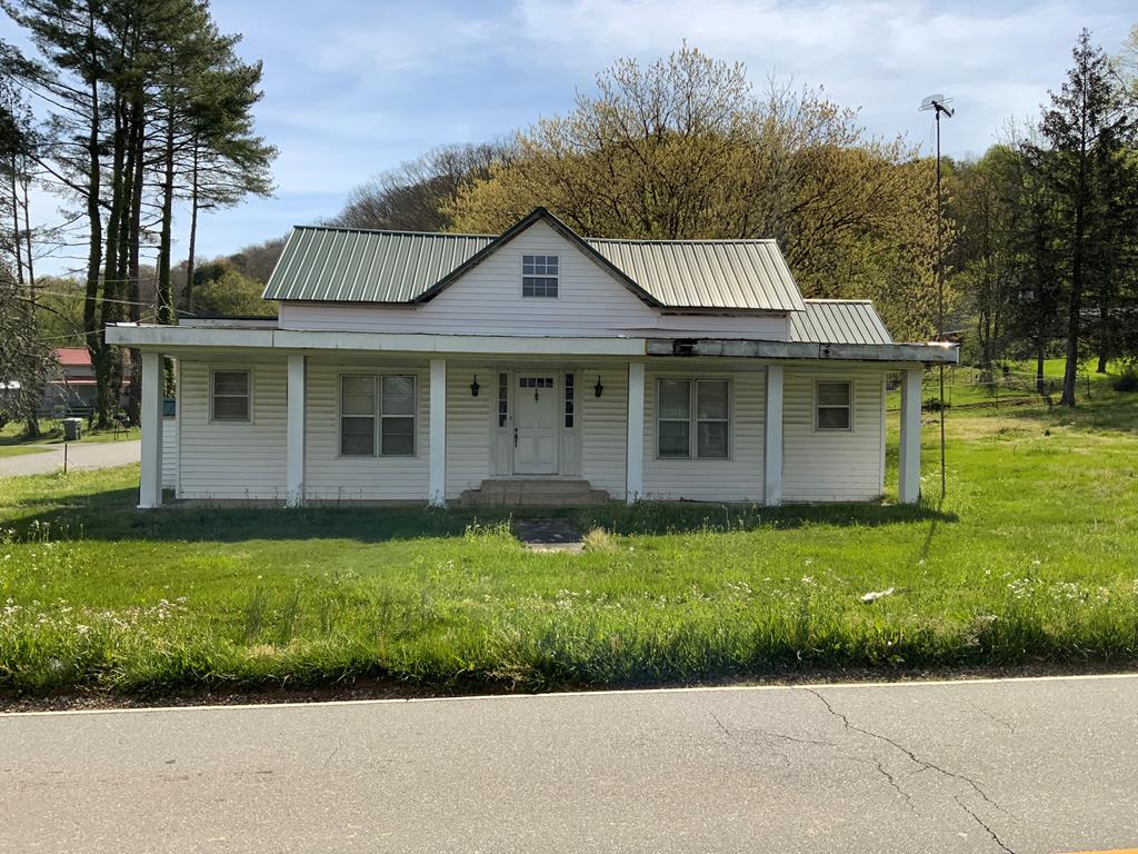 Step back into charm with this delightful 1930s handyman special, perfectly positioned in the heart of Andrews at the intersection of three picturesque streets.  Boasting beautiful mountain views and a good-sized backyard complete with a storage shed, this vintage dollhouse is brimming with character and untapped potential. Yes, it needs some work and tender loving care —but for the right visionary who can imagineer a dazzling new future, this is the ideal time to claim it.  Don't miss your chance to transform this hidden treasure into something truly one-of-a-kind. Come see it today and let your creativity run wild!  ***THIS HOUSE IS NOT FOR RENT ***
