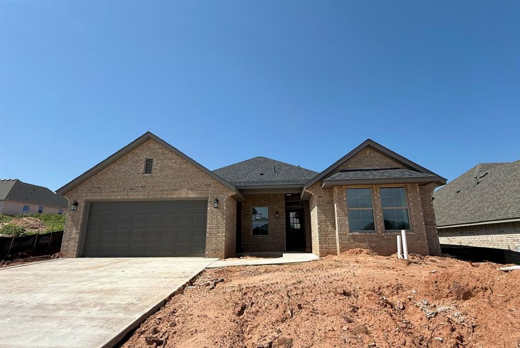 Get ready to fall in love with this thoughtfully designed Ashland plan in East Edmond, scheduled for completion in June. The Au Natural interior design package brings soft, inviting tones and timeless finishes for a warm, grounded feel. At the heart of the home, a spacious kitchen features ceiling-height cabinetry, quartz countertops, a large island, and under-cabinet lighting. The open living area includes a cozy gas fireplace with a rich Urbane Bronze mantel and added lighting, creating the perfect atmosphere for any occasion. The peaceful primary suite offers double vanities with quartz counters, champagne bronze fixtures, and generous closet space. Beautiful built-ins, upgraded hardware, a functional mud bench, and ample storage add everyday convenience with character. Built with energy efficiency at its core, this home features 2x6 exterior walls, spray foam insulation, ENERGY STAR® appliances, high-performance windows, and a right-sized HVAC system for better comfort, healthier air, and long-term savings. A tankless water heater, storm shelter, and sprinkler system add extra peace of mind. Located just 1 mile from I-35 in Covell Valley, you’ll enjoy top-rated Edmond schools and a growing community with a pool and clubhouse on the way. Floor plan represents the base design; specific features may vary. Contact us today for more information.