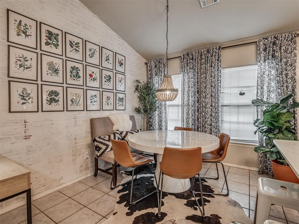 ADORABLE! Updated 3 bed 2 bath home in Edmond! A grand entryway with high ceilings and arched doorways, creates a spacious and open feel from the minute you walk in. The high ceilings continue throughout the home, adding to the sense of space and light. The heart of the home is the HUGE, stunning, updated kitchen—with quartz countertops, an island, gas range, coffee bar with open shelving, and a pantry. There’s a dining space in the kitchen, accented by a stylish feature wall, plus a formal dining room that can easily double as a second living area, playroom, or office. The primary suite is large enough for oversized furniture and sits separate from the other bedrooms. The updated primary en-suite bath includes dual sinks, a walk-in tiled shower, and a large jetted tub. Recent updates include new HVAC (2021), water heater (2021), and roof (2023), a storm shelter (2019), smart light switched throughout the home, plus updated lighting fixtures throughout. Enjoy the outdoors on the covered patio overlooking a nice backyard with a small greenbelt behind—so no neighbors directly at your back fence line!